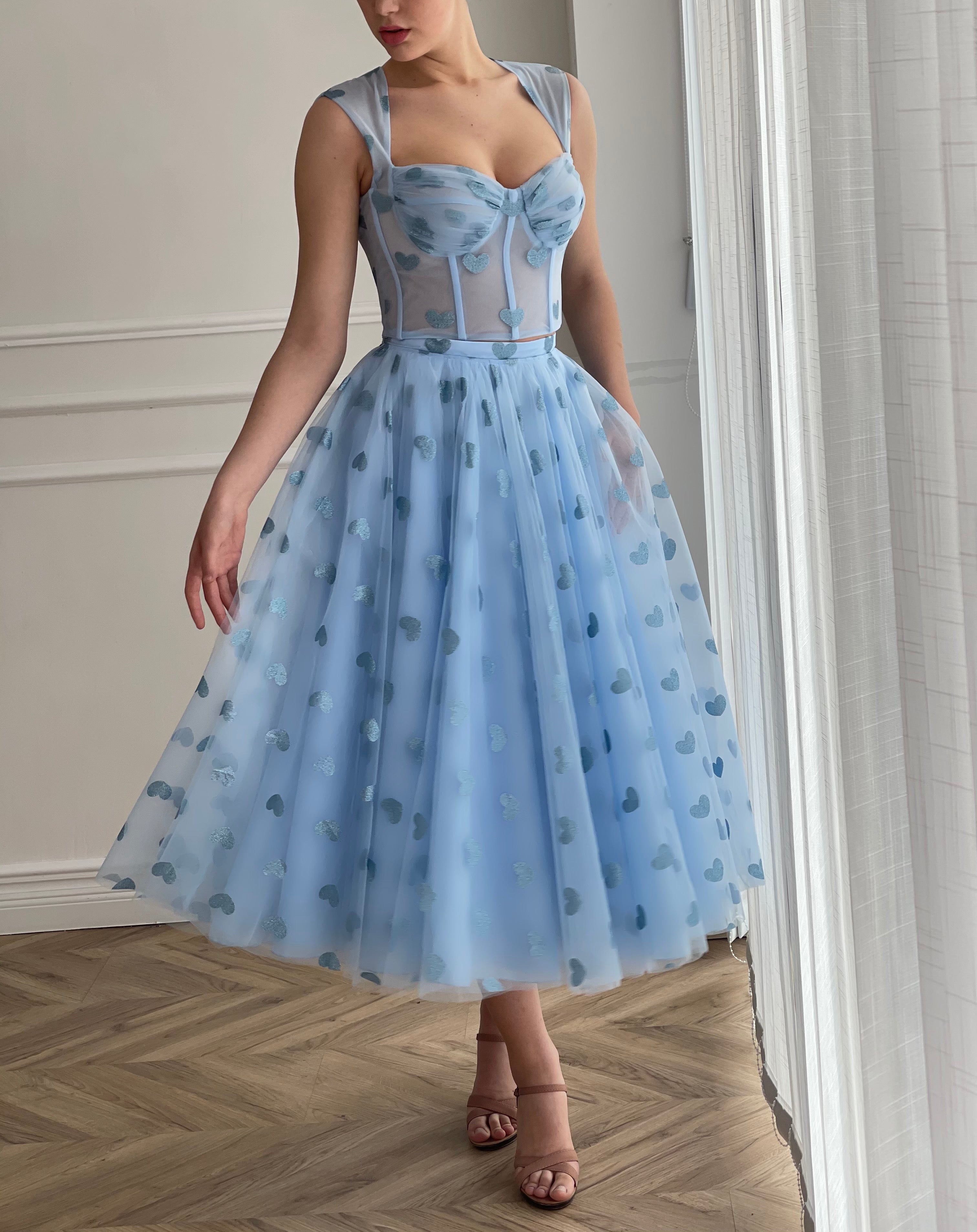 Blue two piece dress with straps and hearty fabric