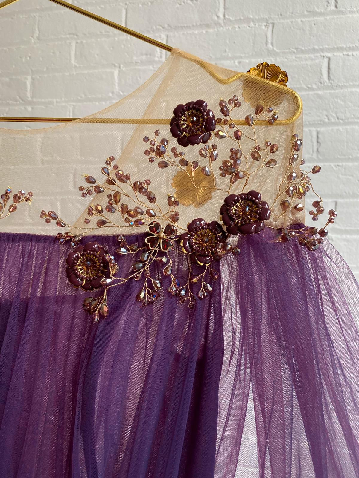 Purple A-Line dress with long off the shoulder sleeves and embroidery