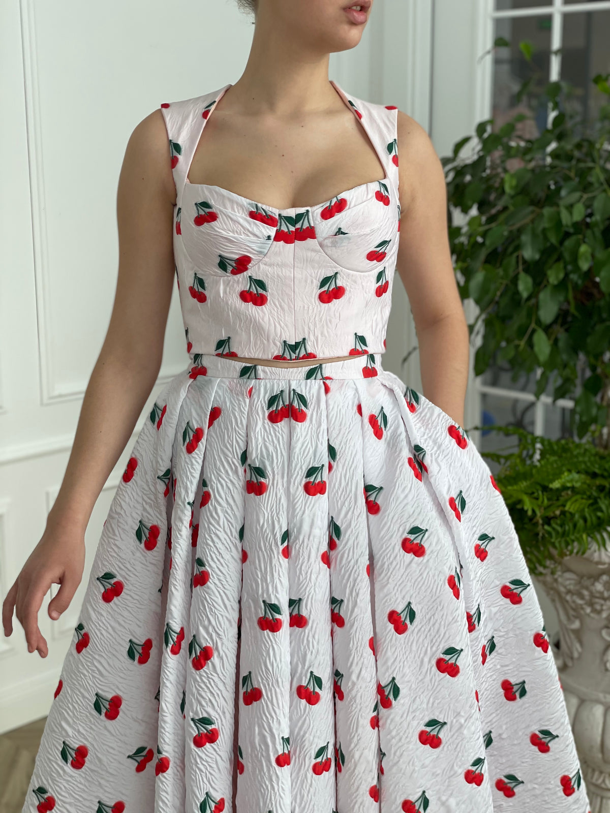White two piece dress with printed cherries and straps