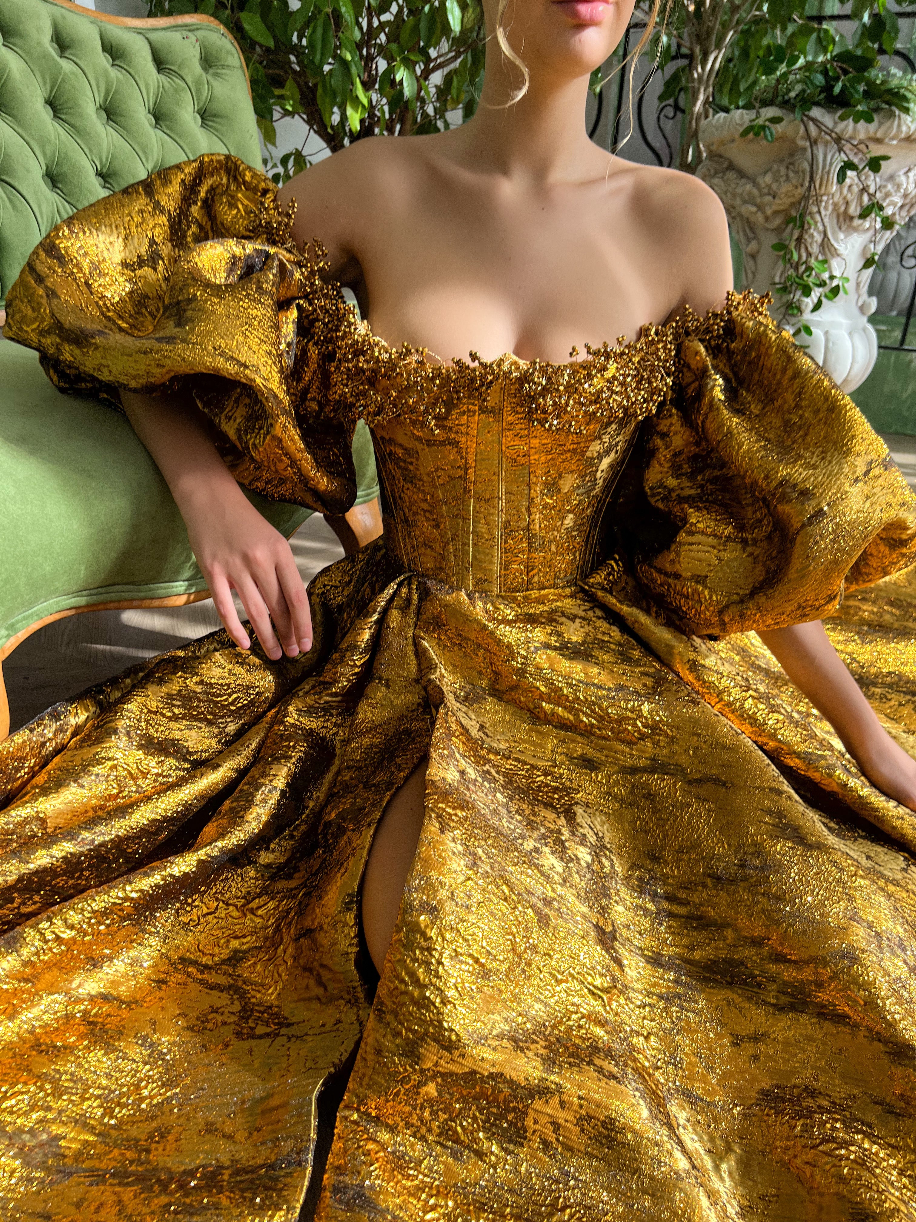 Gold A-Line dress with off the shoulder sleeves and embroidery