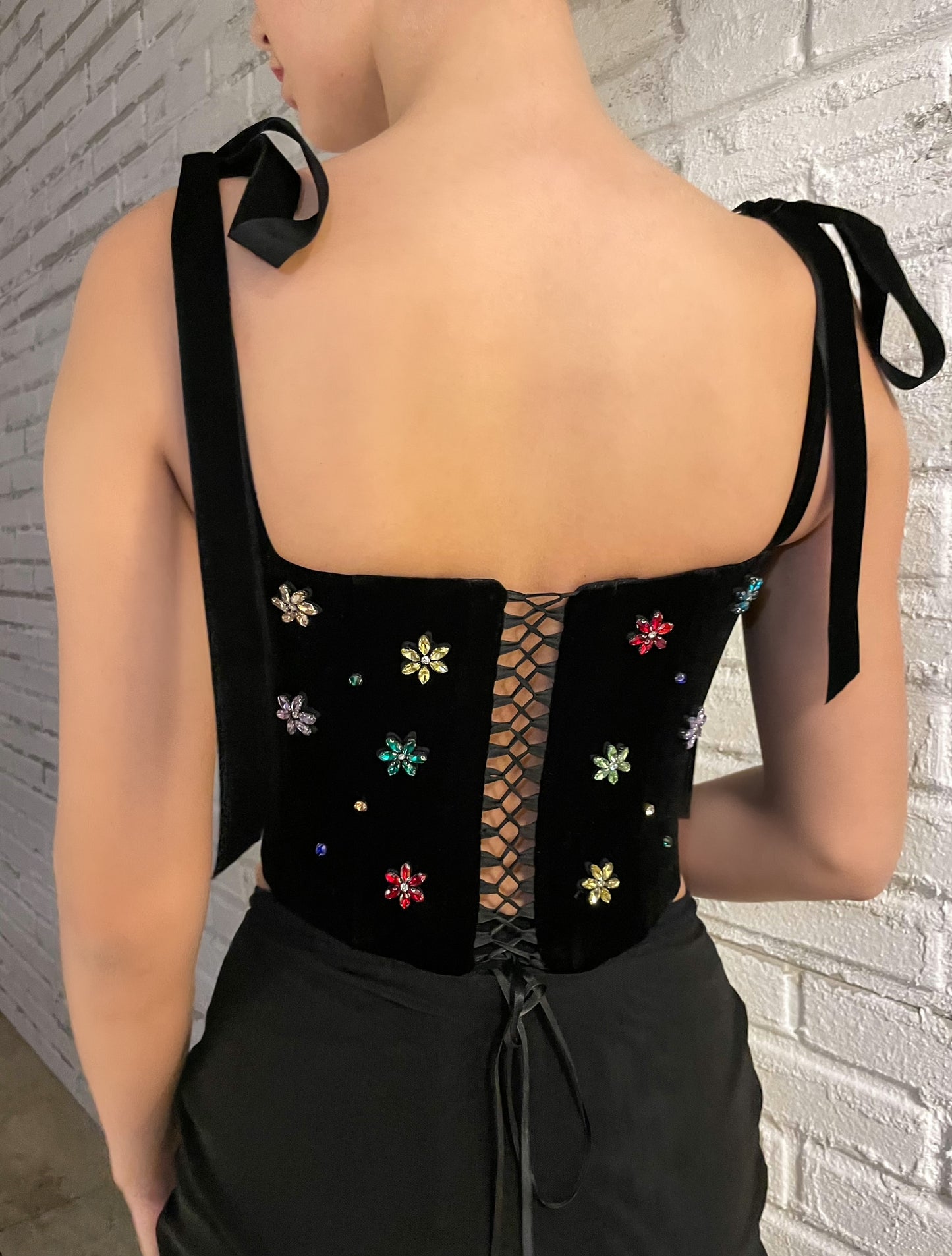 Black corset with bow straps and embroidery