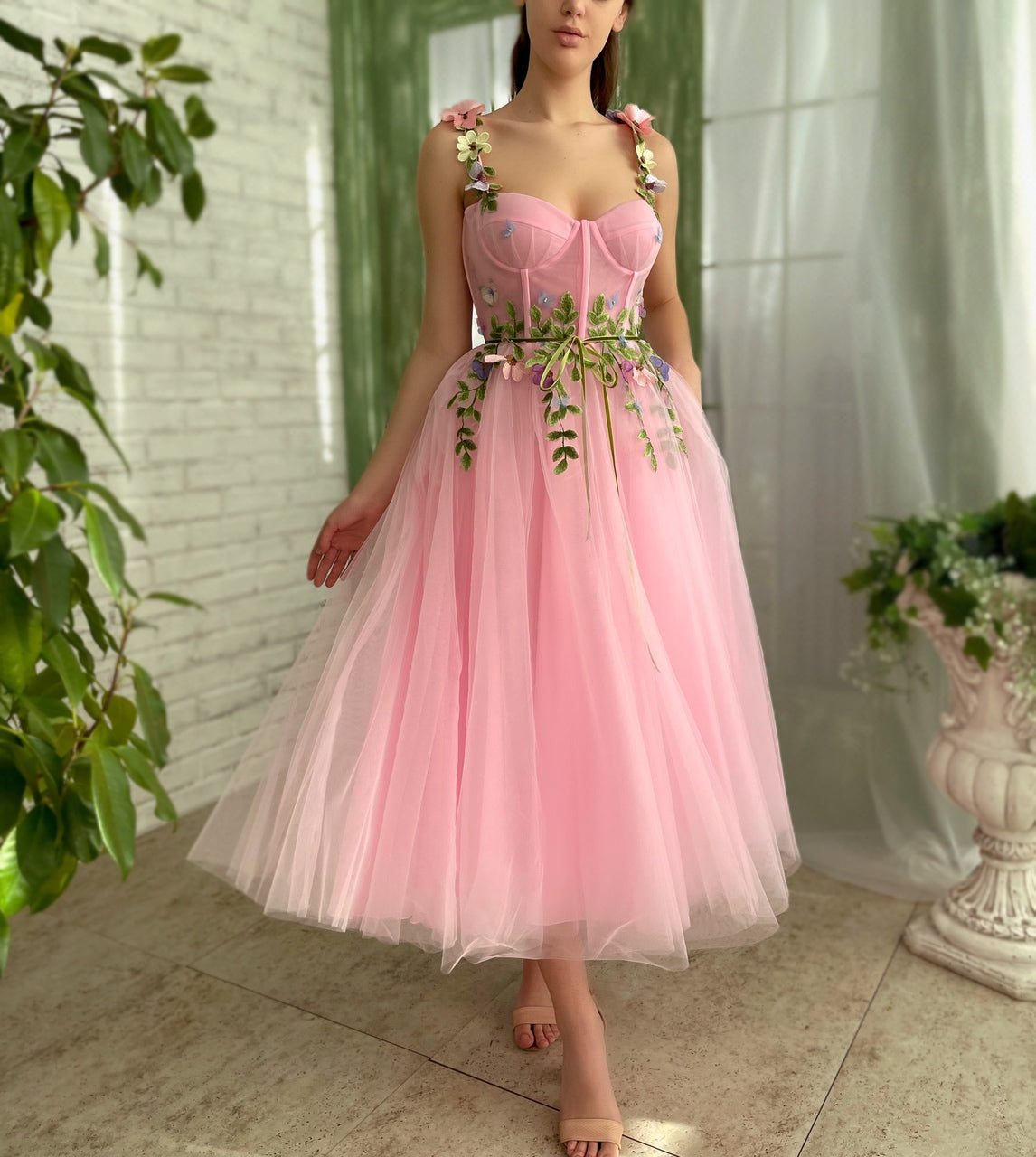 Pink midi dress with spaghetti straps and embroidery