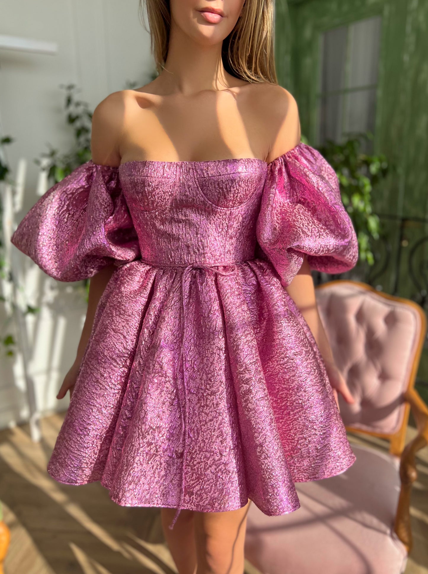 Pink mini dress with off the shoulder sleeves and taffeta brocade fabric