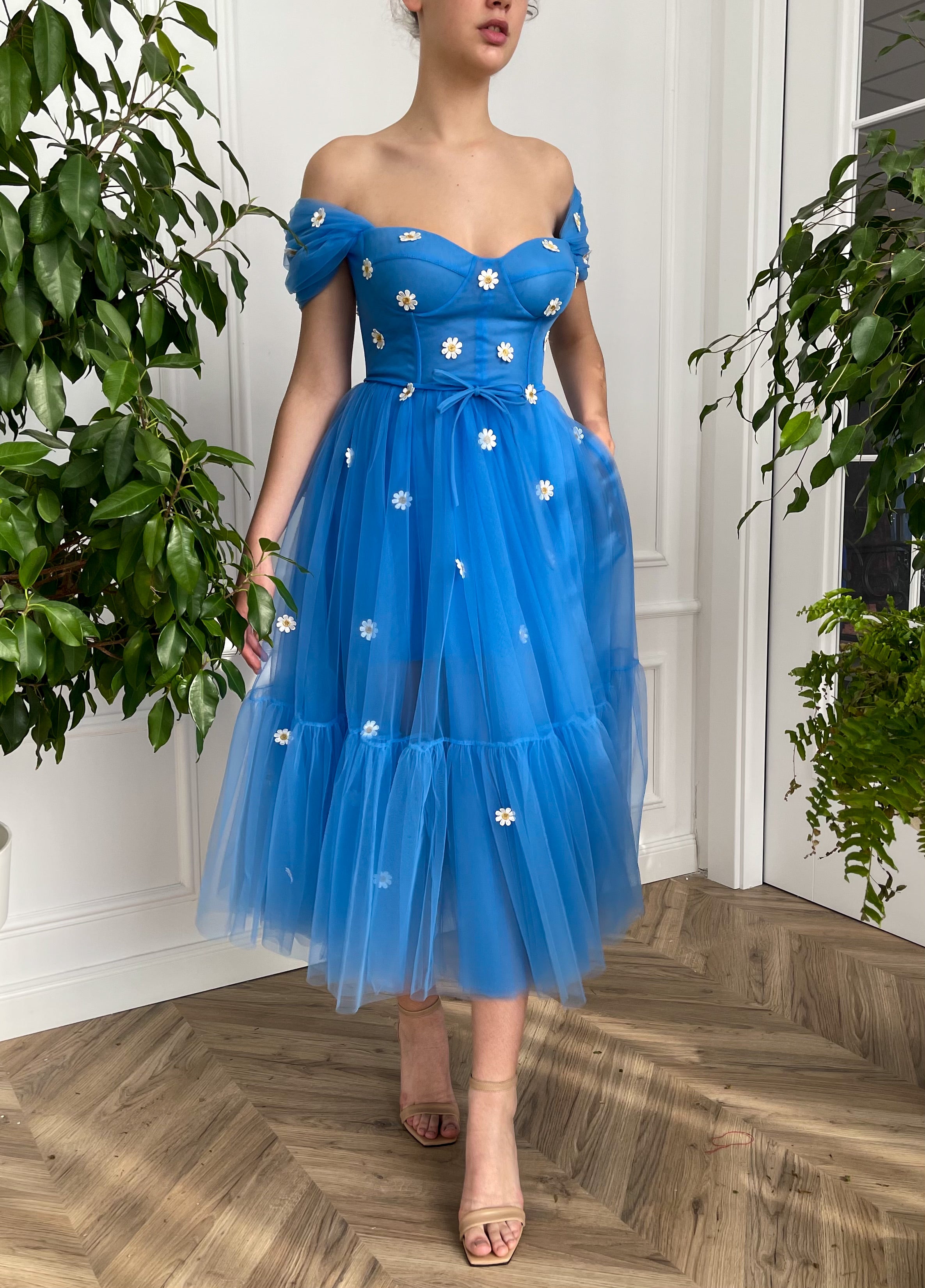 Blue midi dress with off the shoulder sleeves and embroidered daisies