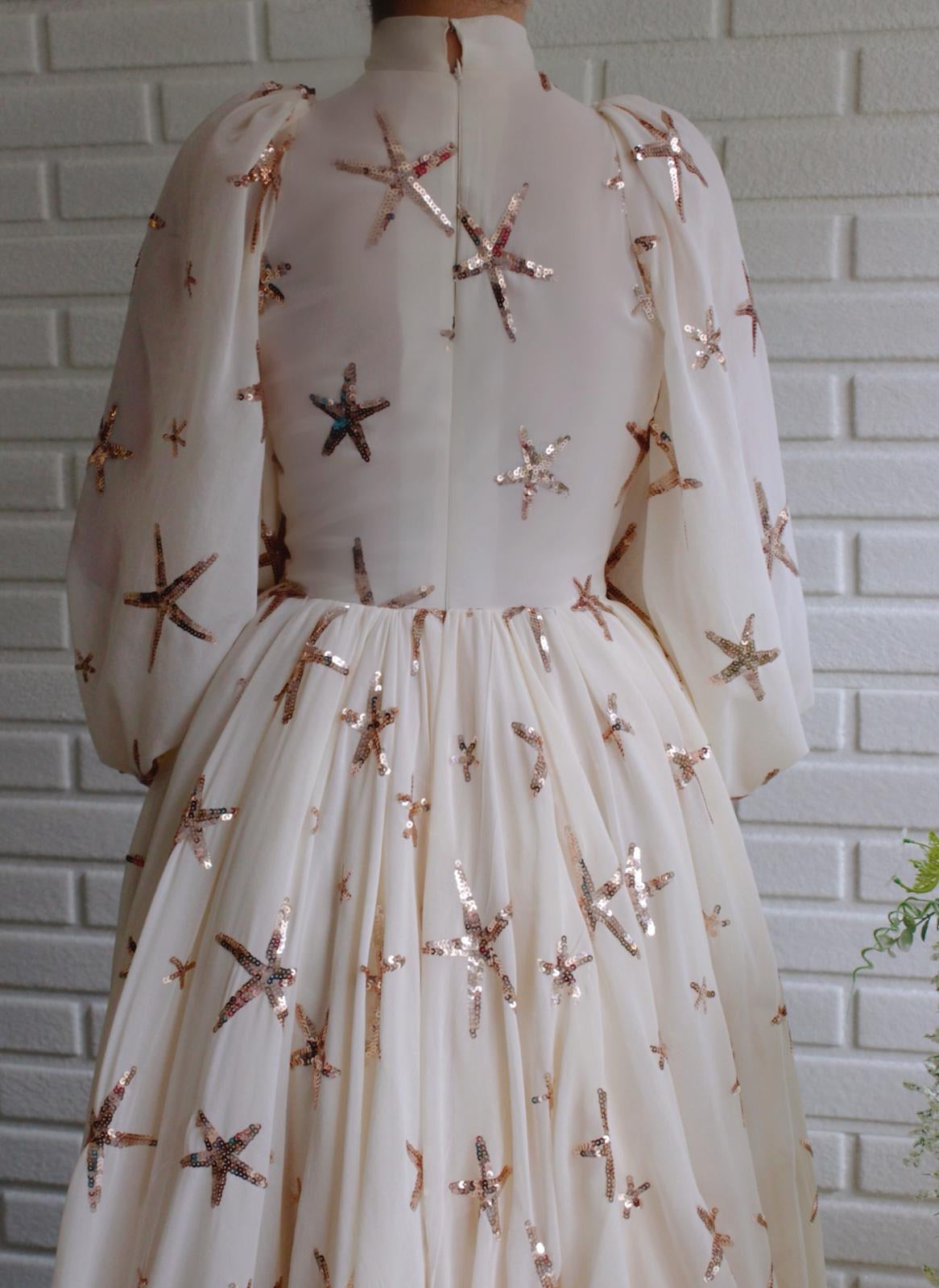 White A-Line dress with starry embroidery and long sleeves