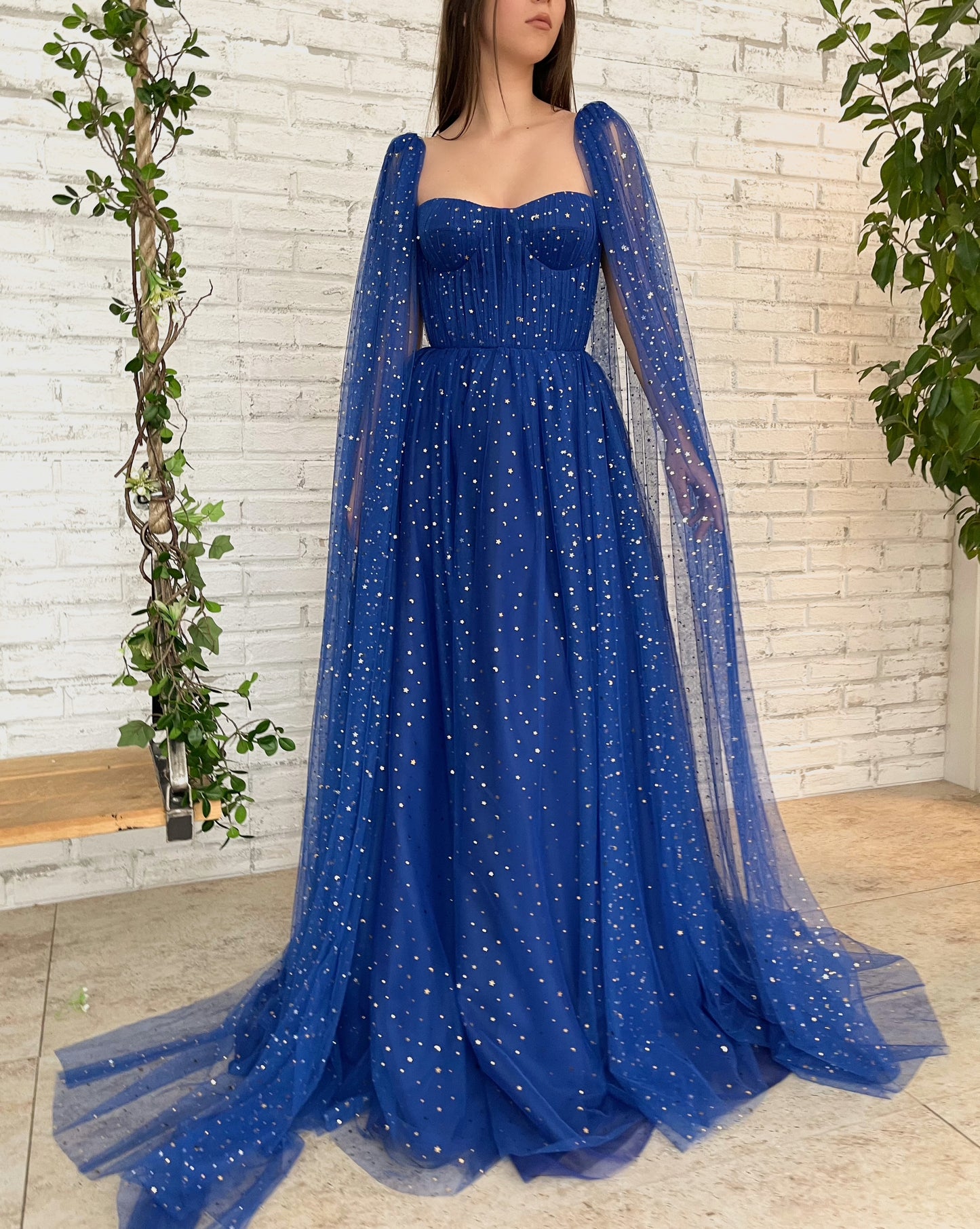 Wish Upon a Star Gown - Teuta MatoshiBlue A-Line dress with cape sleeves, spaghetti straps and starry fabric