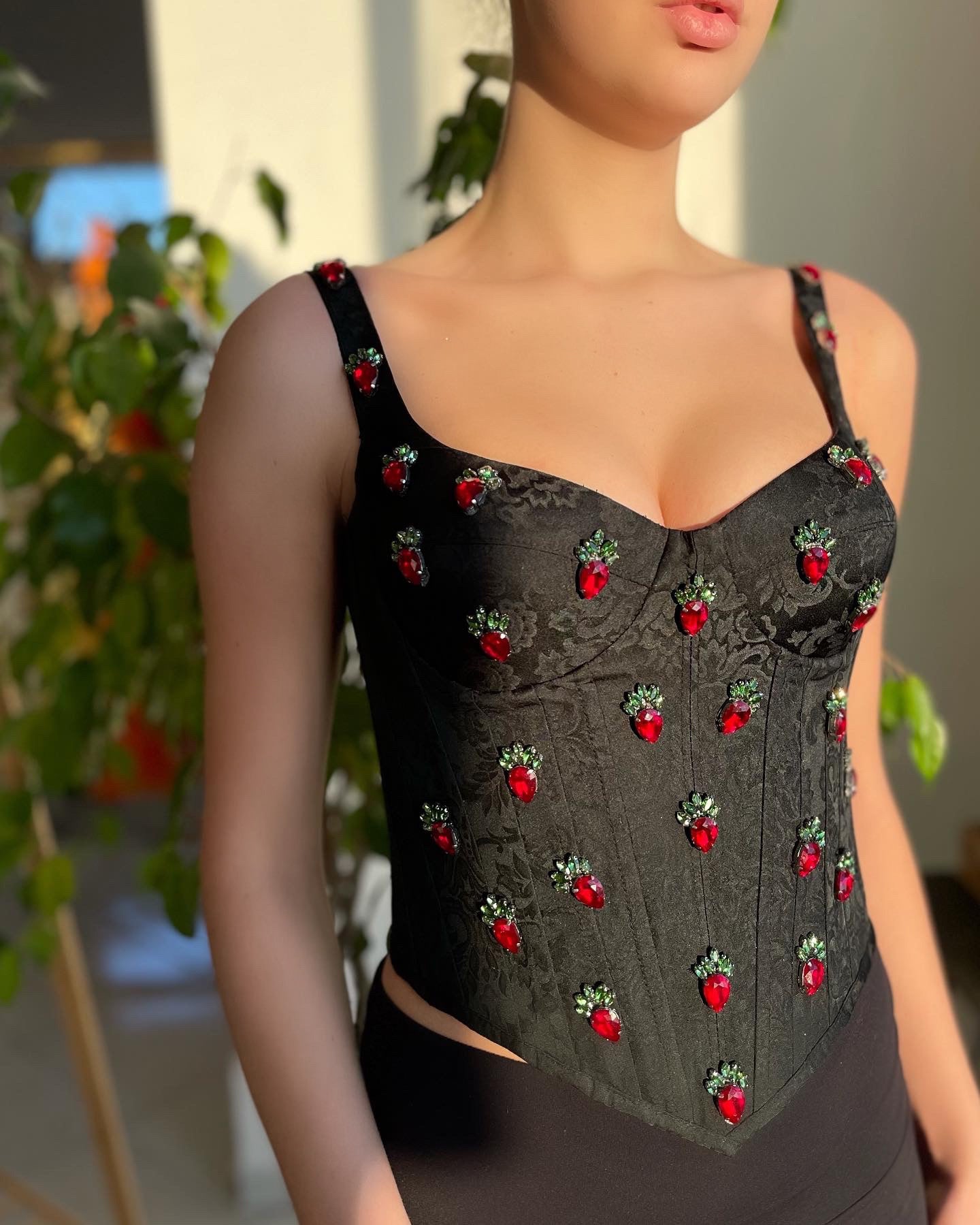 Black corset with straps and embroidery