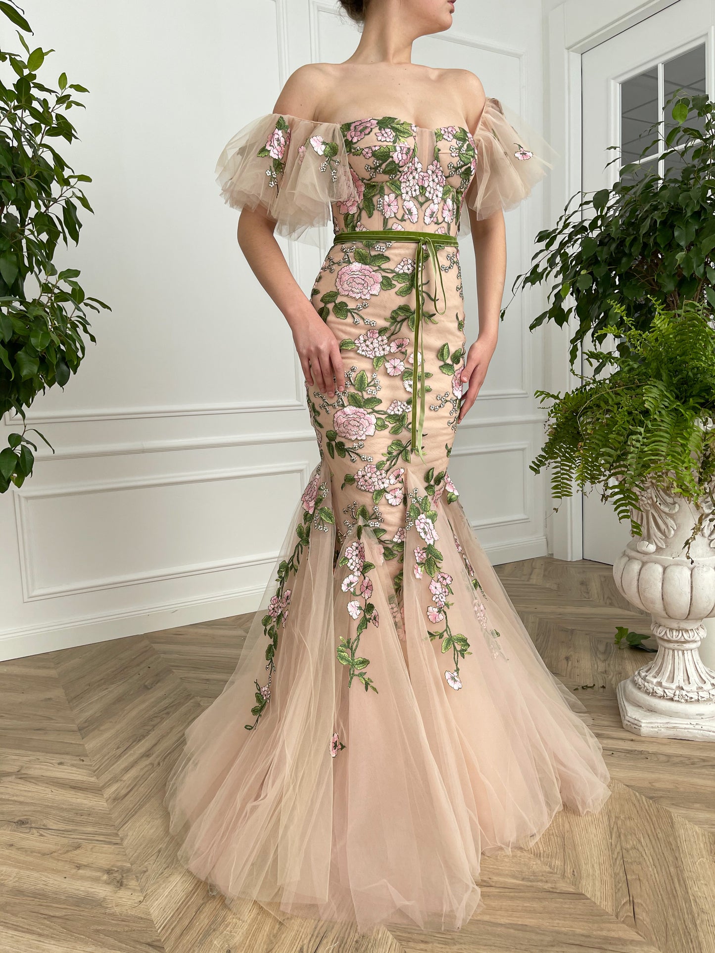 Beige mermaid dress with off the shoulder sleeves and printed flowers