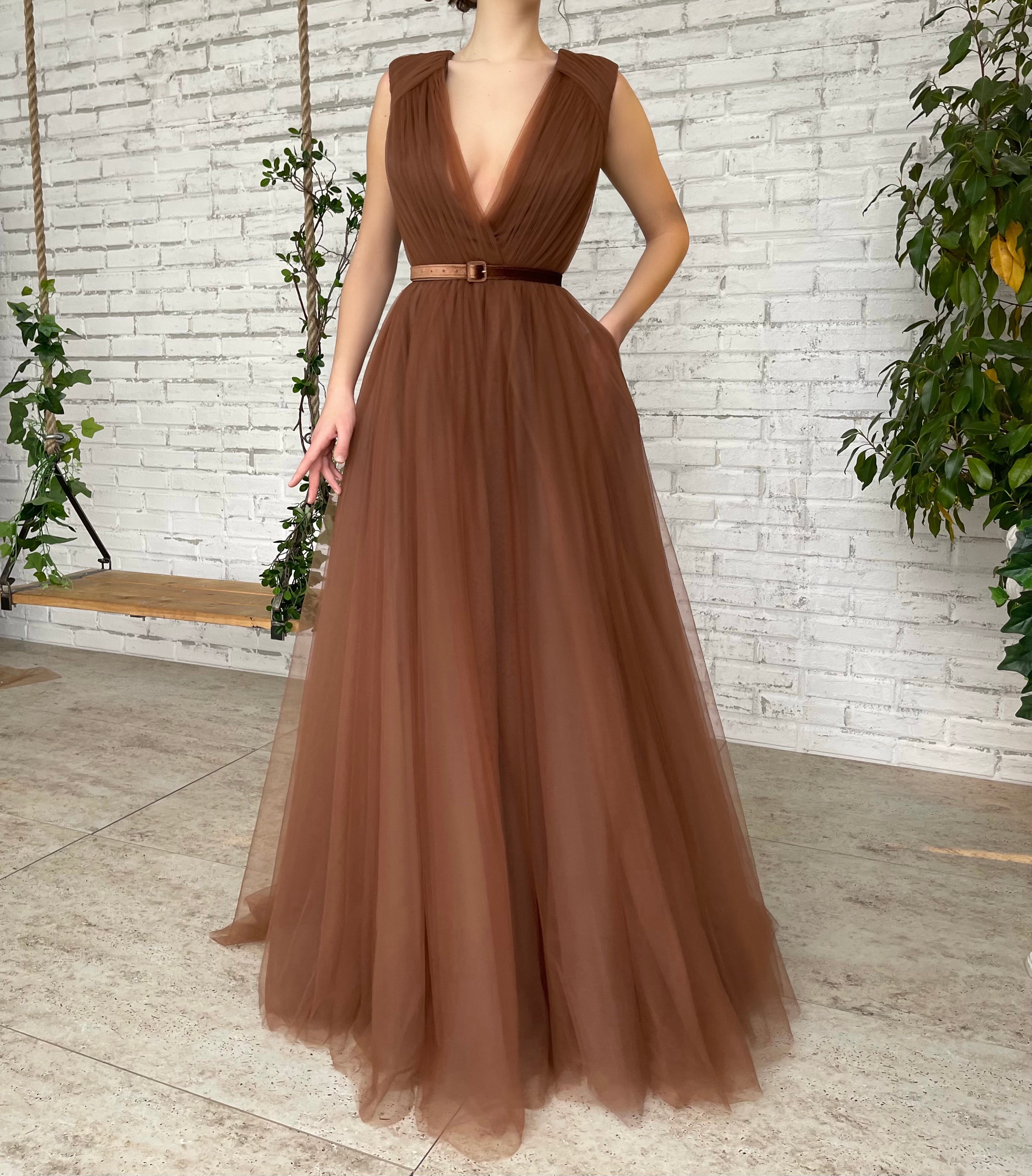 Brown A-Line dress with belt, no sleeves and v-neck