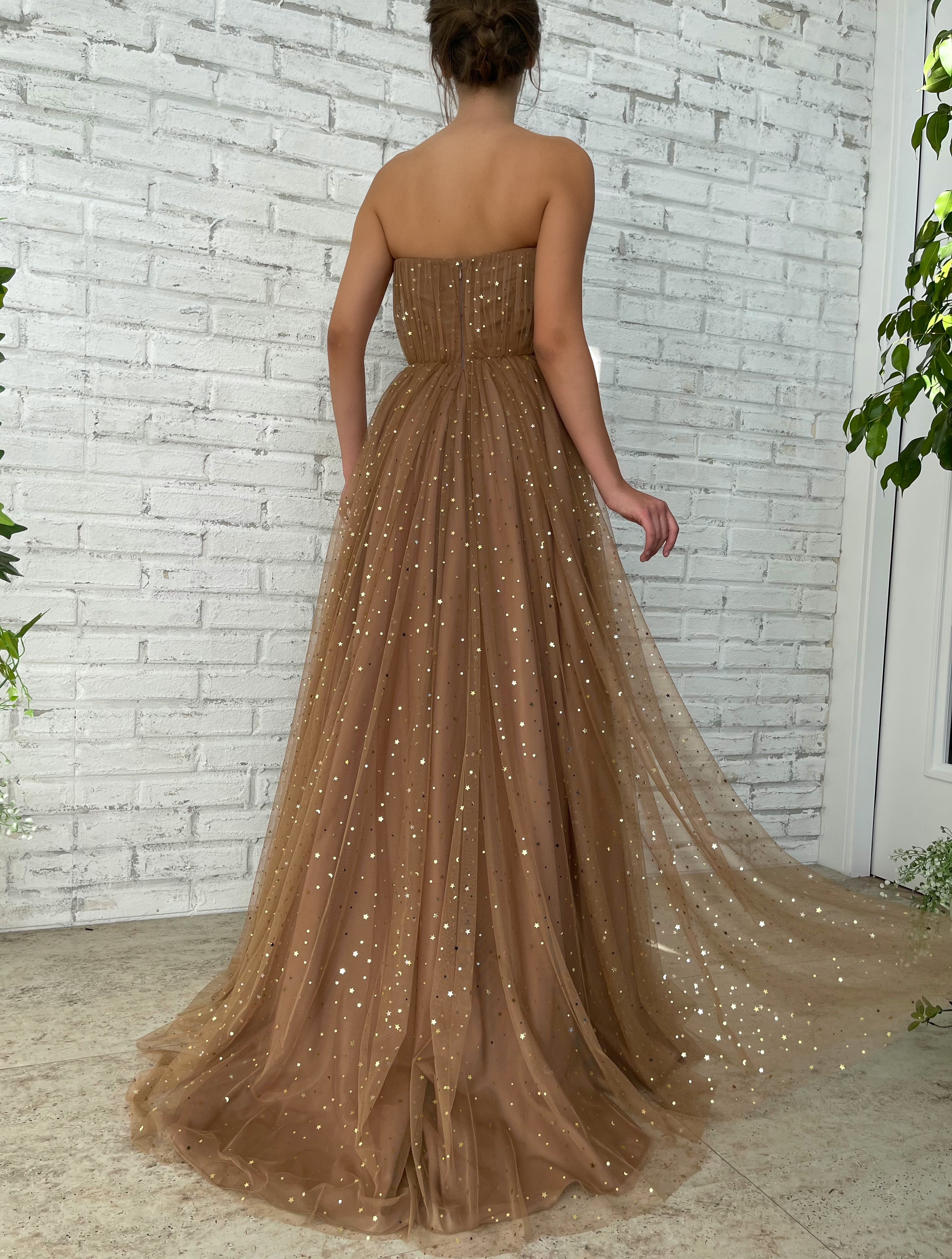 Brown A-Line dress with no sleeves and starry fabric