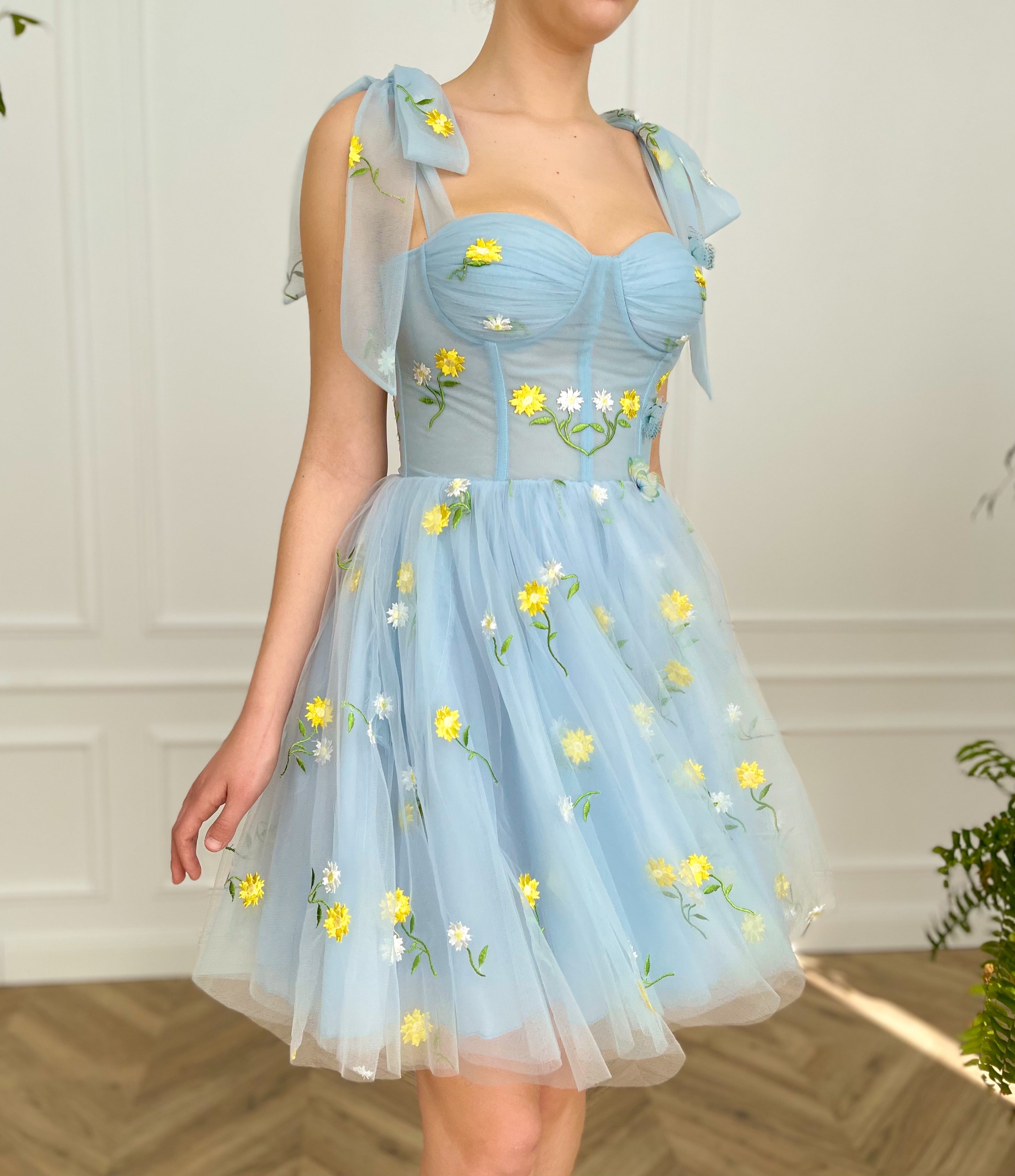 Blue mini dress with bow straps and flowers