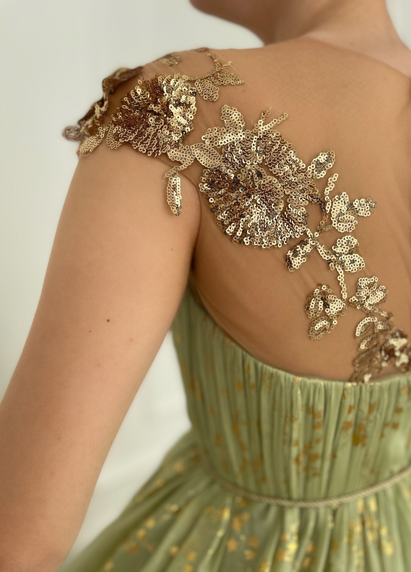 Green A-Line dress with cap sleeves, v-neck and embroidery