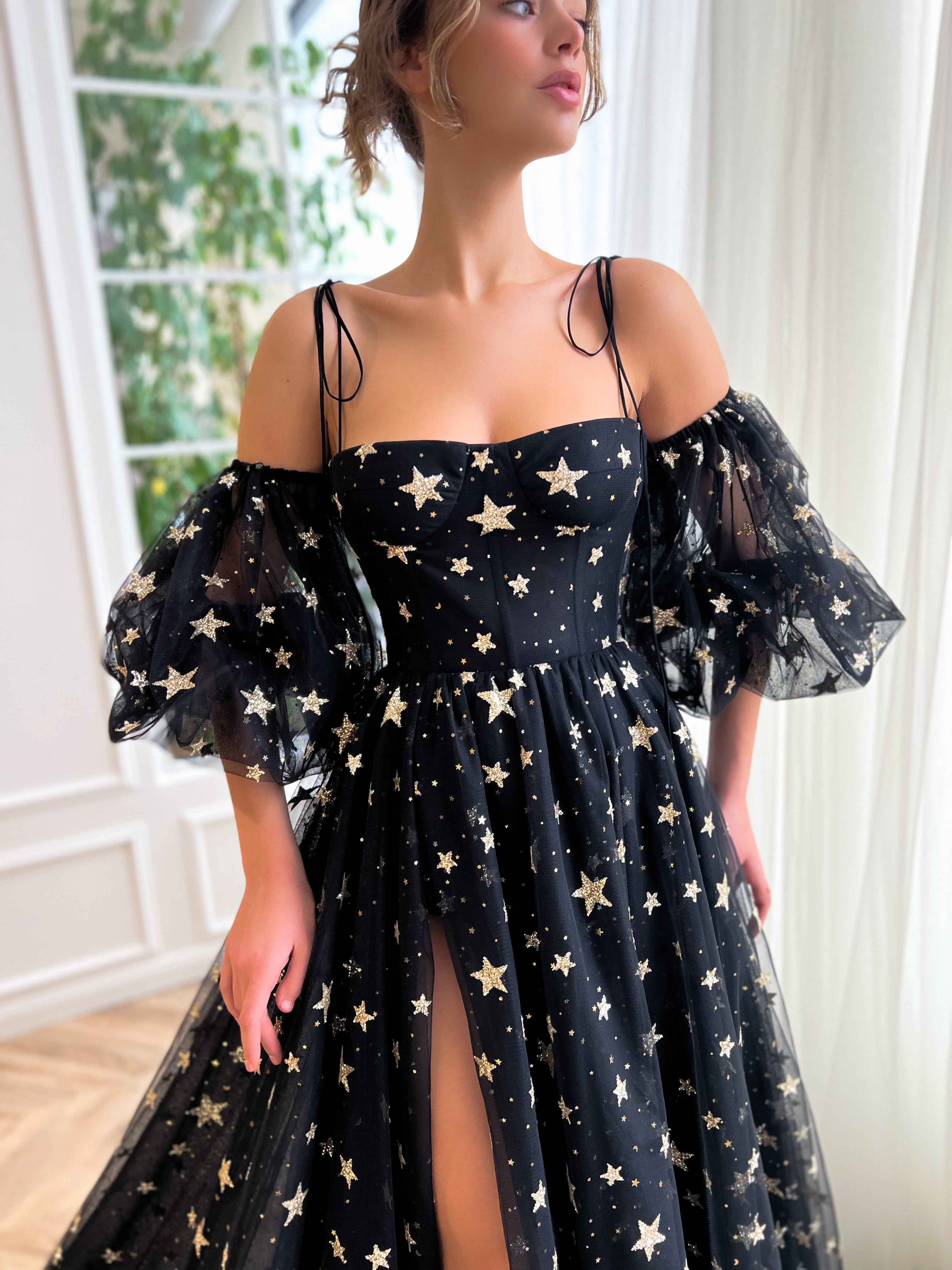 Black A-Line dress with spaghetti straps, off the shoulder sleeves and starry fabric