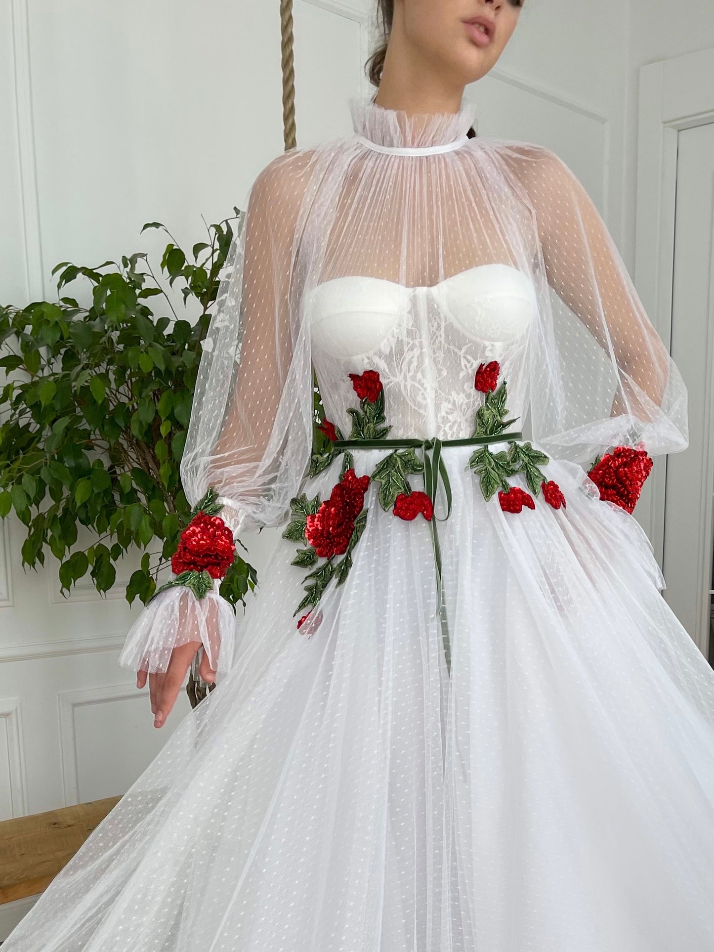 A Line white bridal dress with long sleeves and embroidered flowers