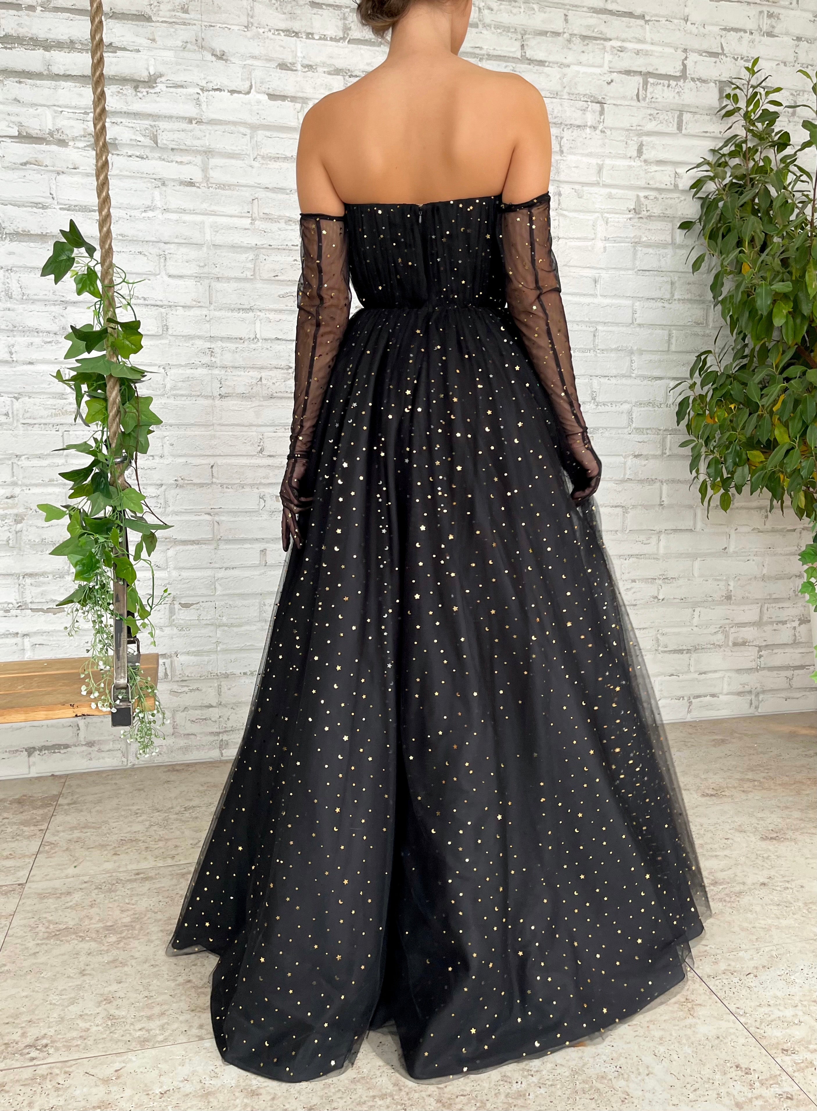 Black A-Line dress with cape sleeves, gloves and starry fabric