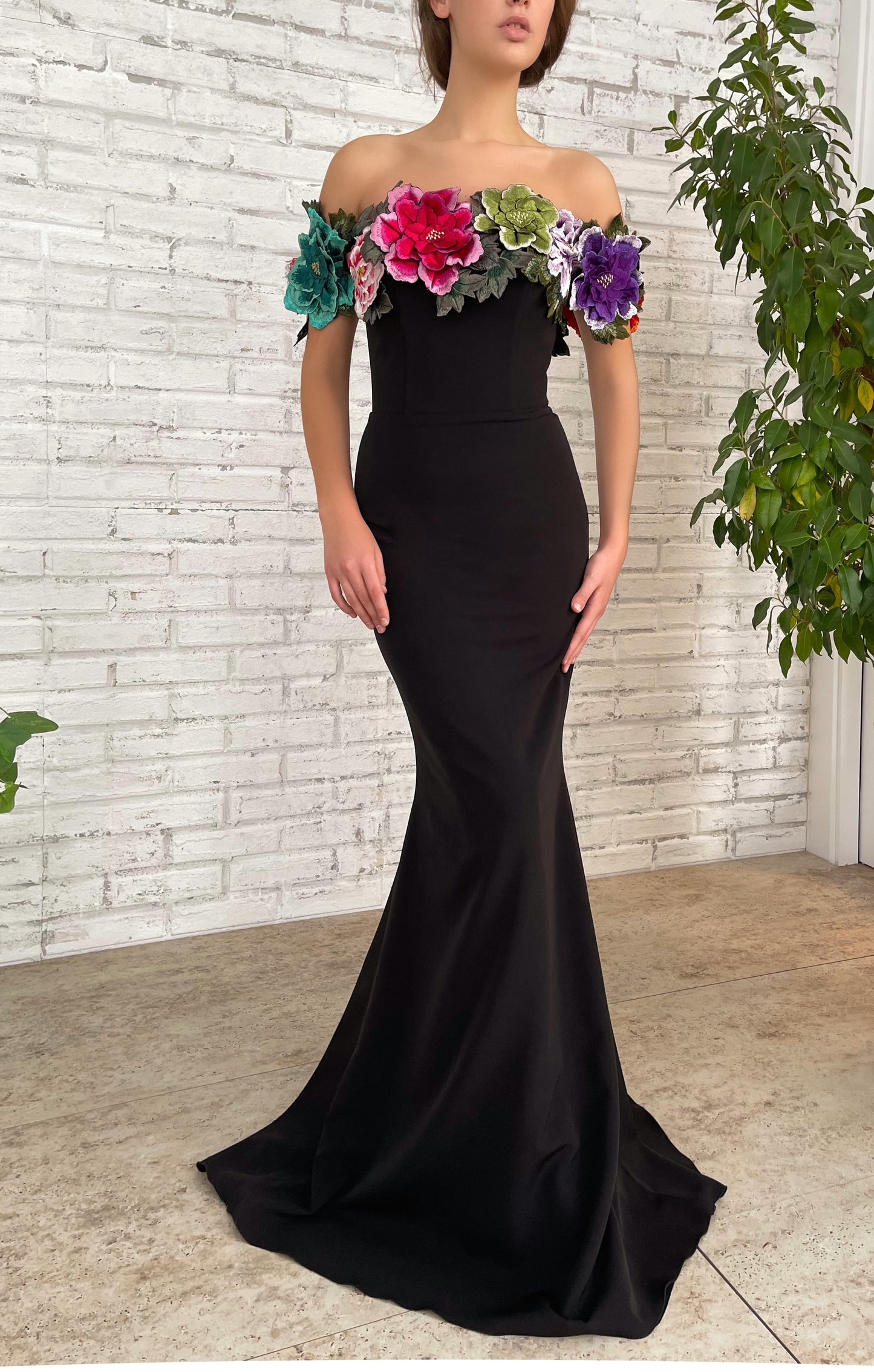 Black mermaid dress with off the shoulder sleeves and embroidery