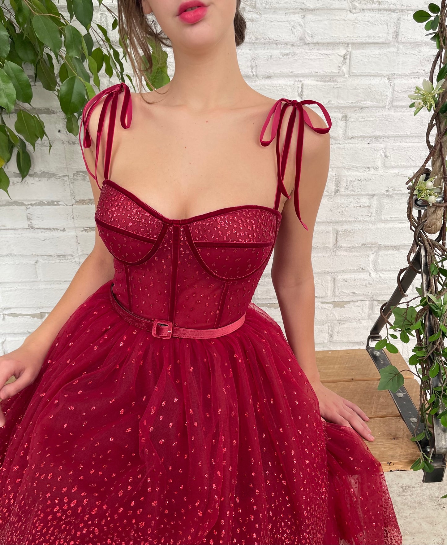 Red midi dress with spaghetti straps and belt