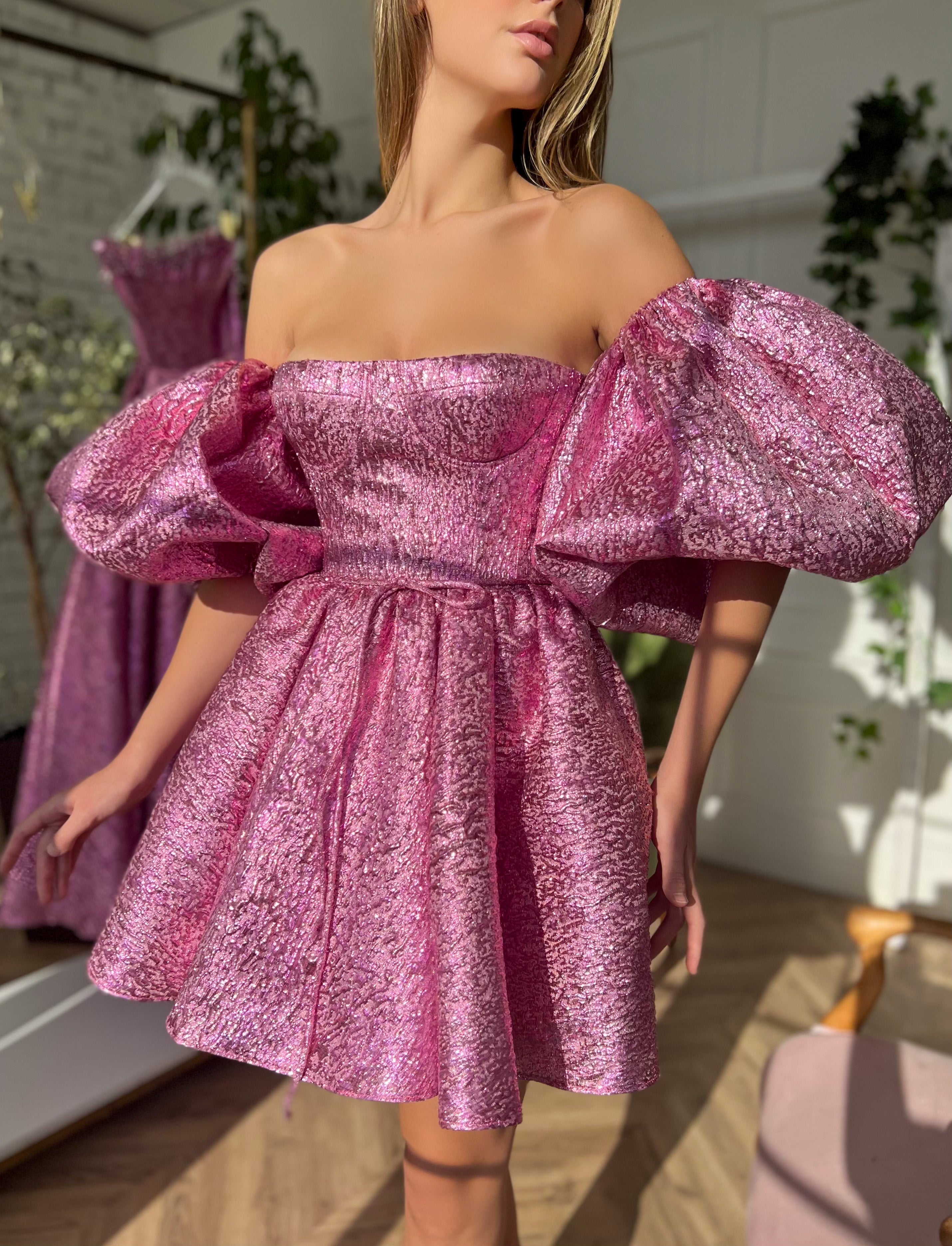 Pink mini dress with off the shoulder sleeves and taffeta brocade fabric