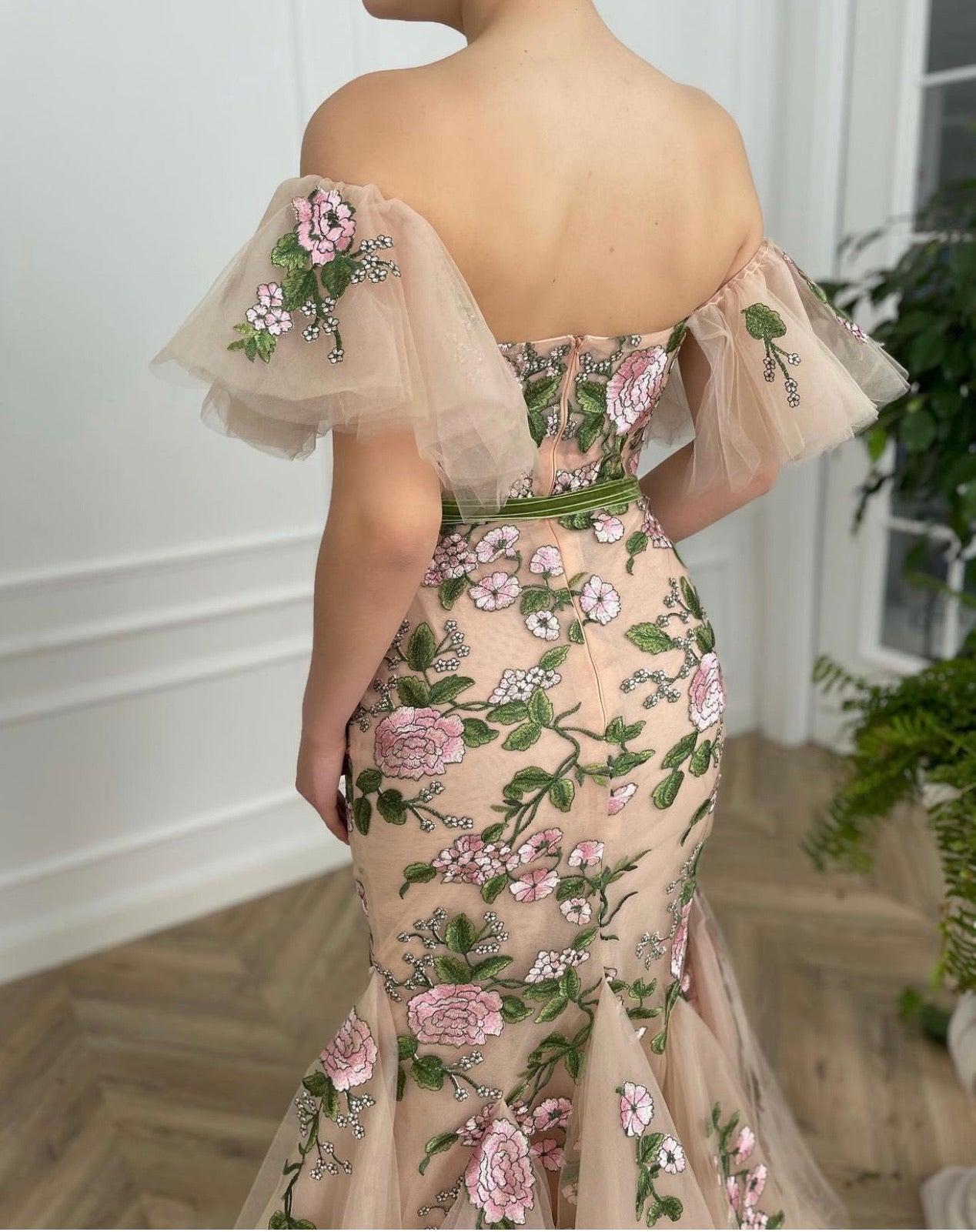 Beige mermaid dress with off the shoulder sleeves and printed flowers