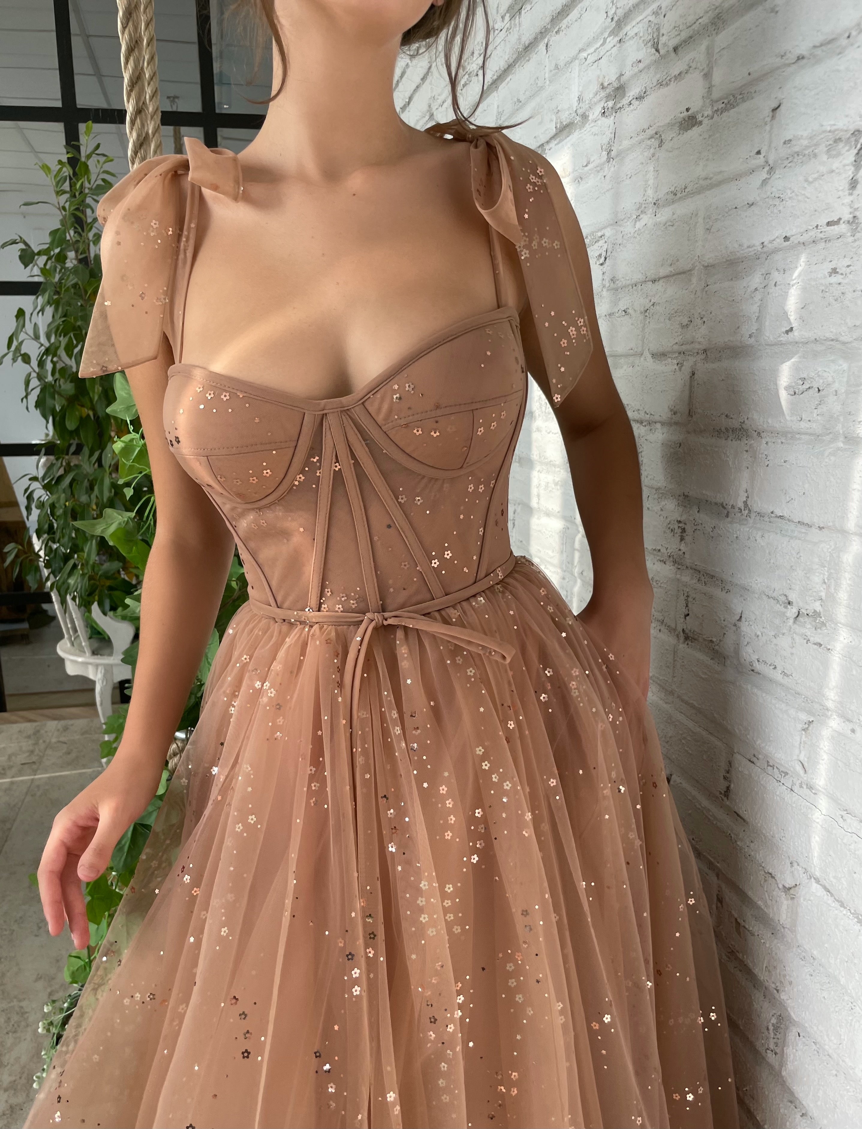 Brown midi dress with bow straps and starry fabric
