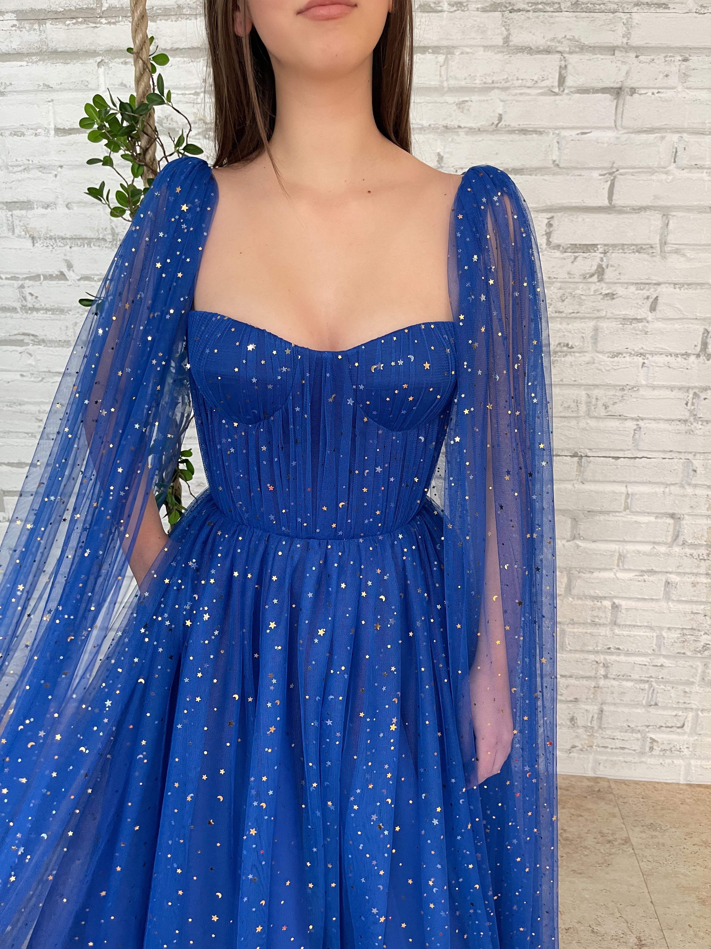 Blue A-Line dress with cape sleeves, spaghetti straps and starry fabric