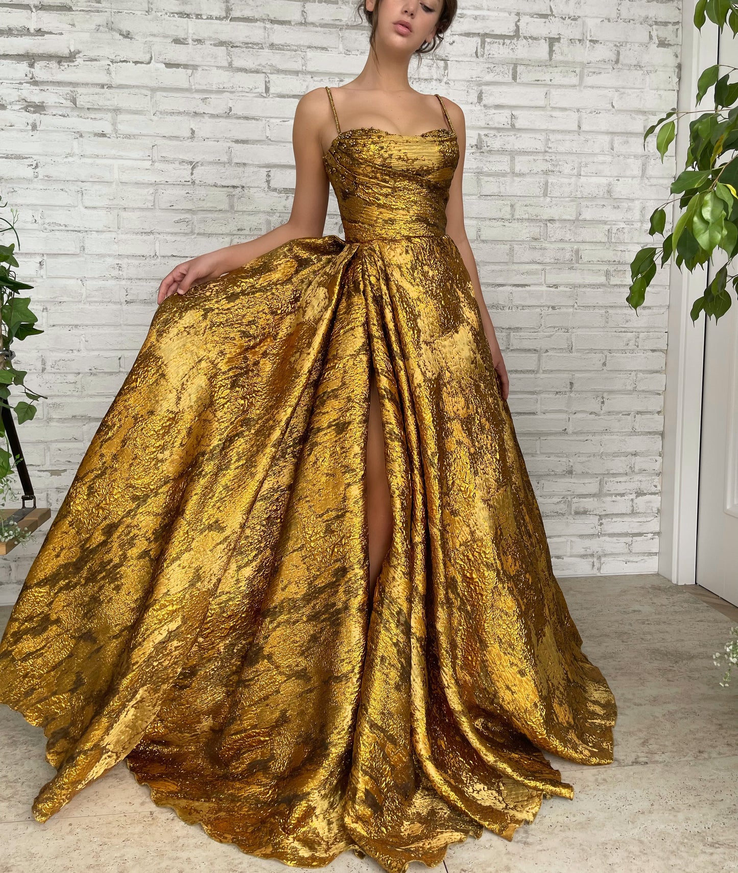 Gold A-Line dress with spaghetti straps and beading