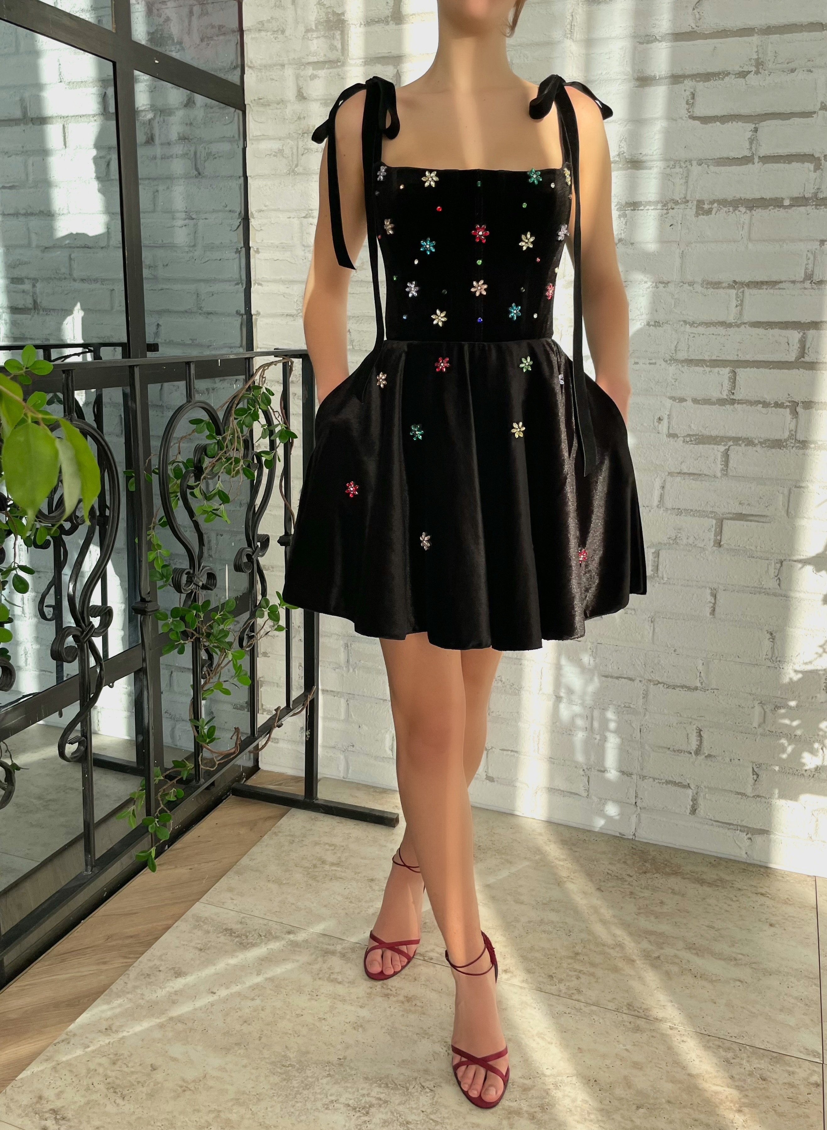 Black mini dress with bow straps and embroidery