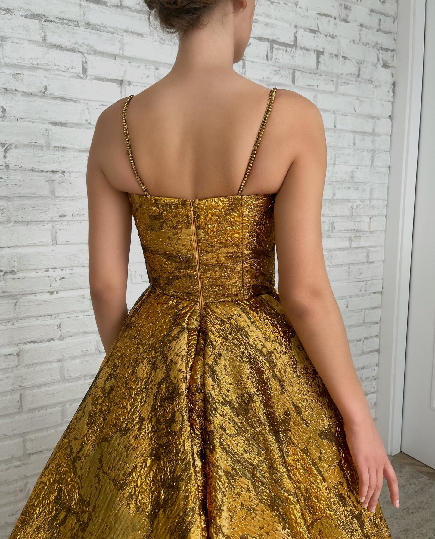 Gold A-Line dress with spaghetti straps and beading