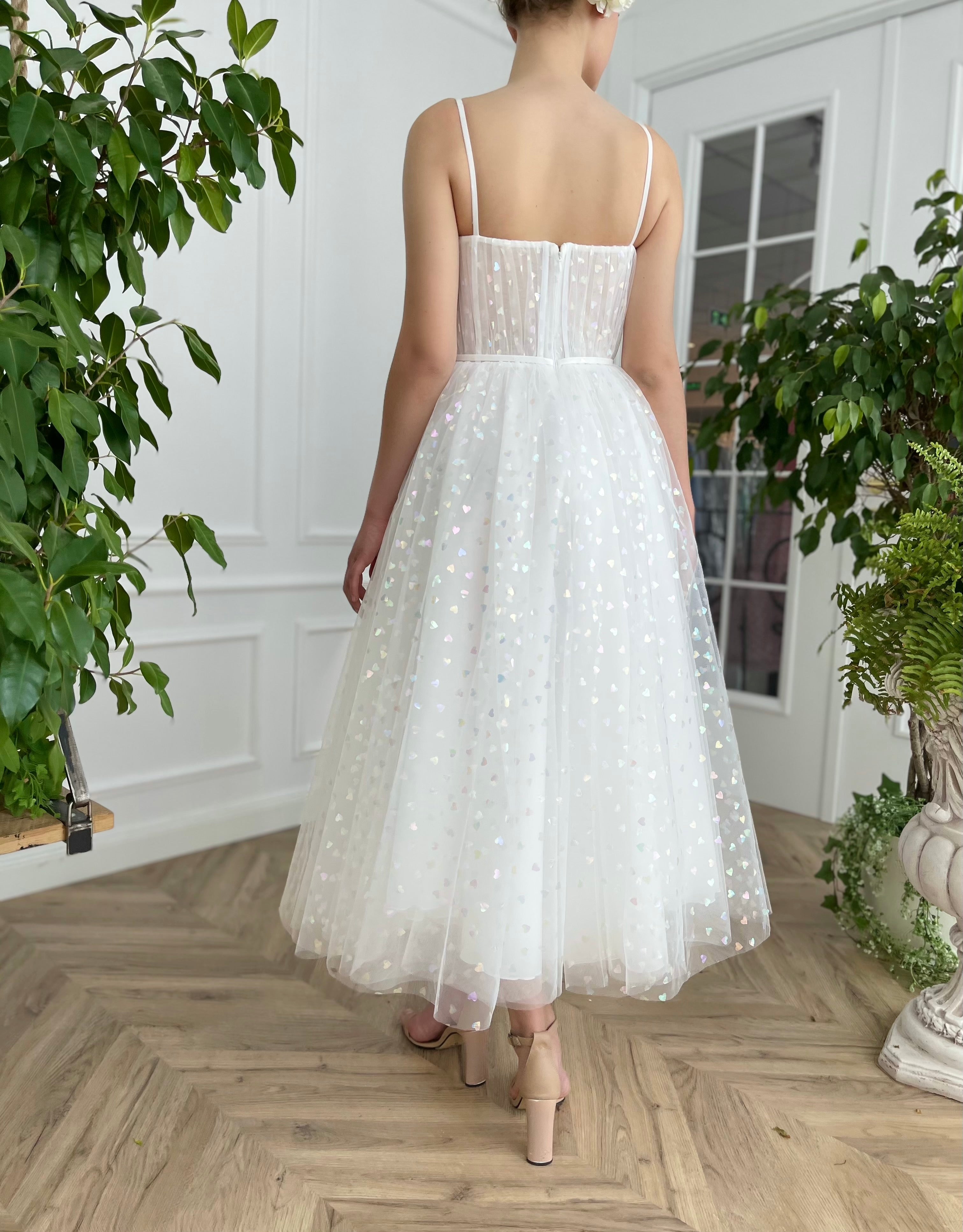 Midi white bridal dress with printed hearts and spaghetti straps
