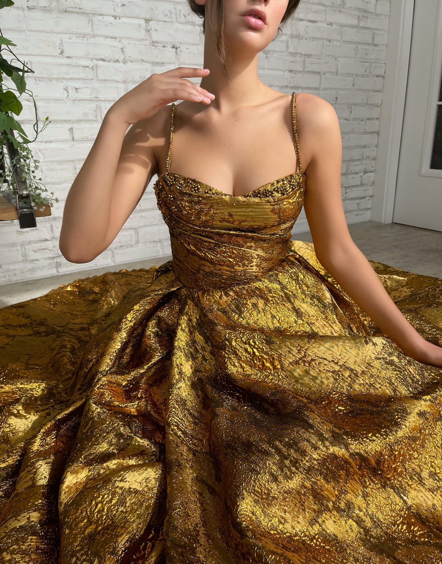 Gold A-Line dress with spaghetti straps and beading