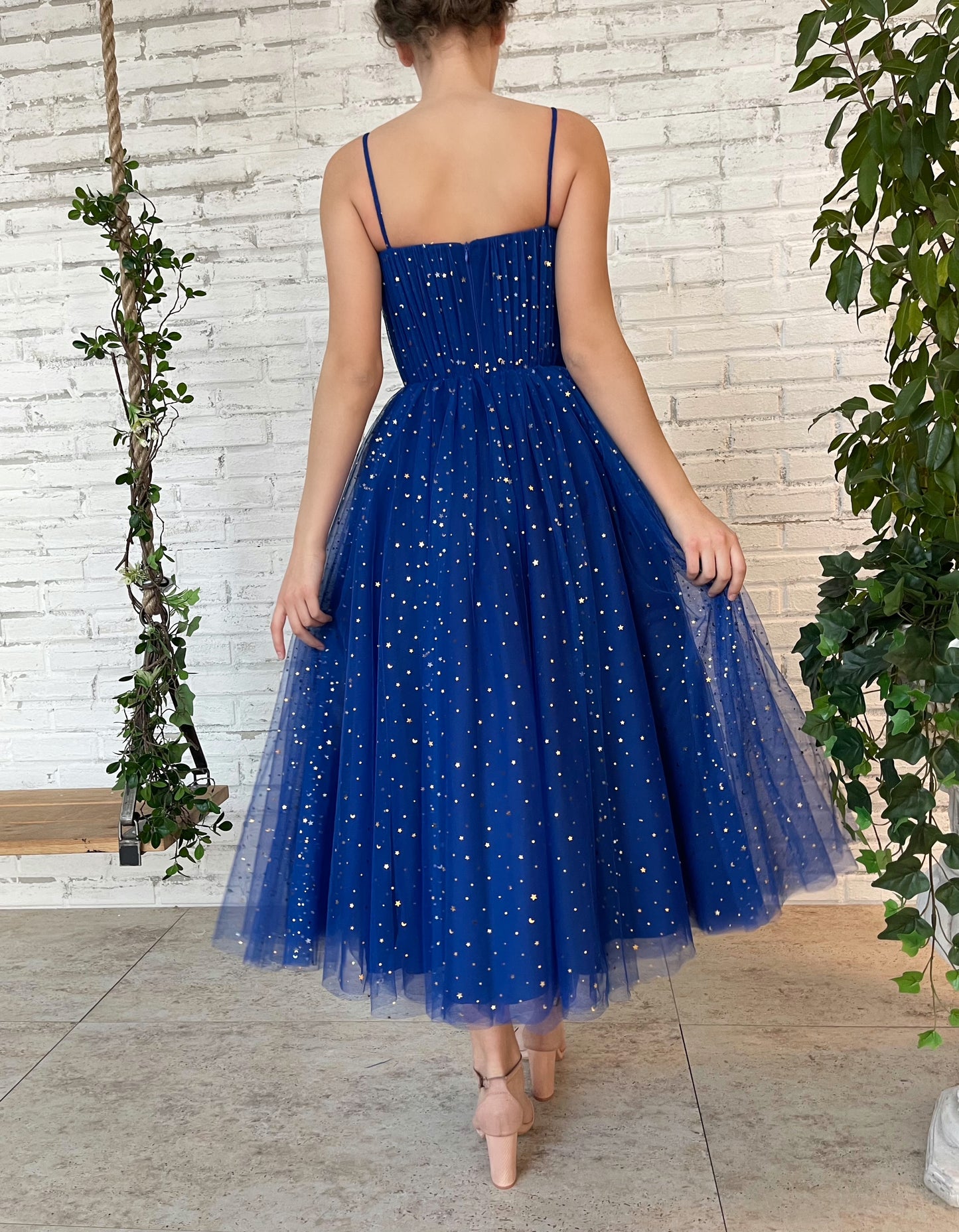 Blue midi dress with spaghetti straps and starry fabric