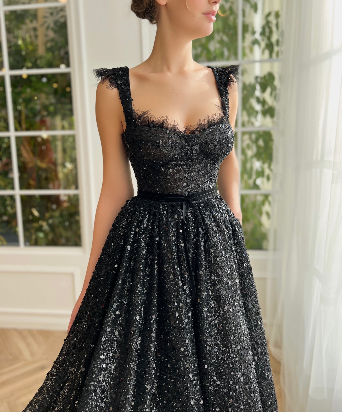 Black midi dress with sequins and straps