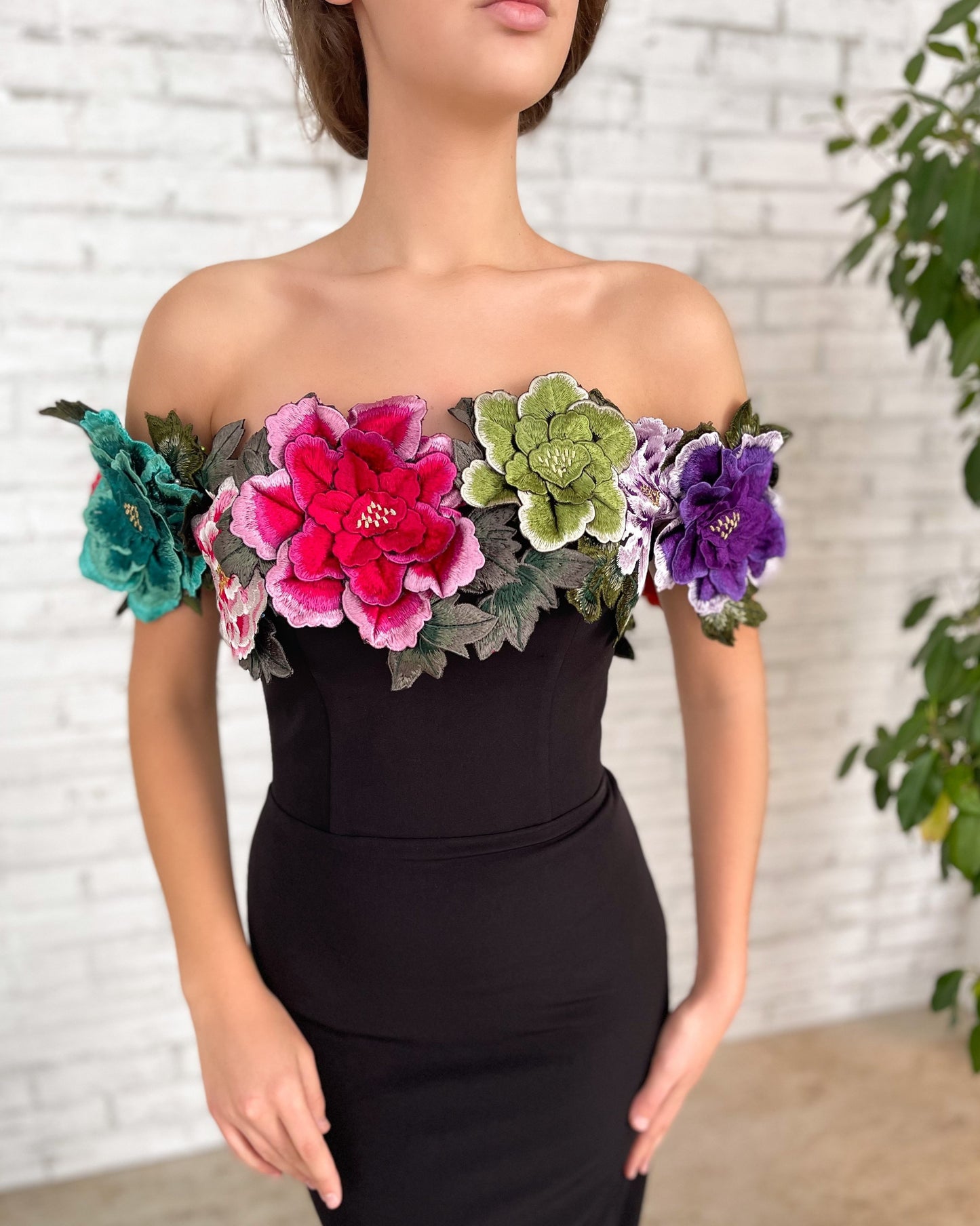 Black mermaid dress with off the shoulder sleeves and embroidery