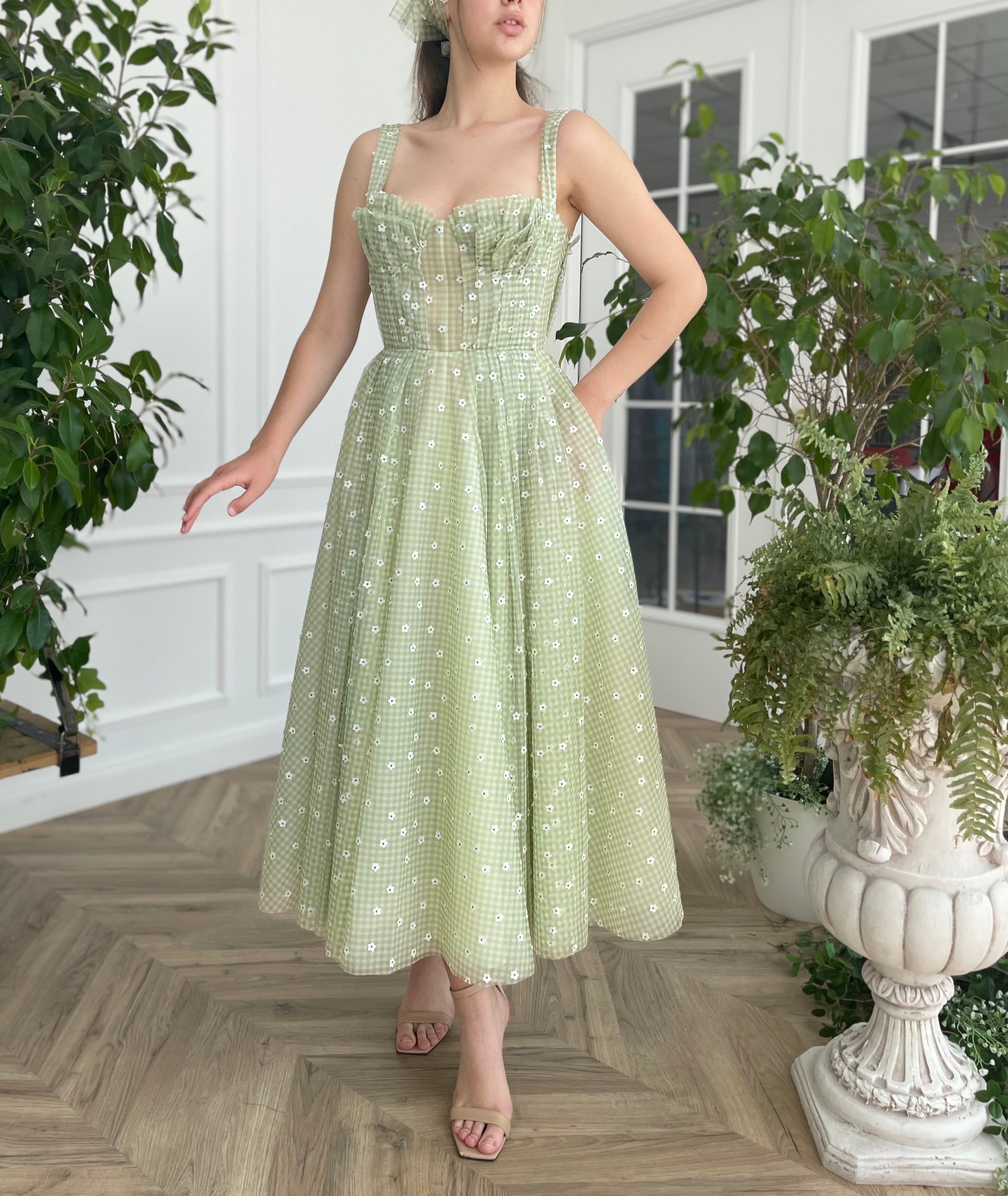 Green midi dress with daisies and straps