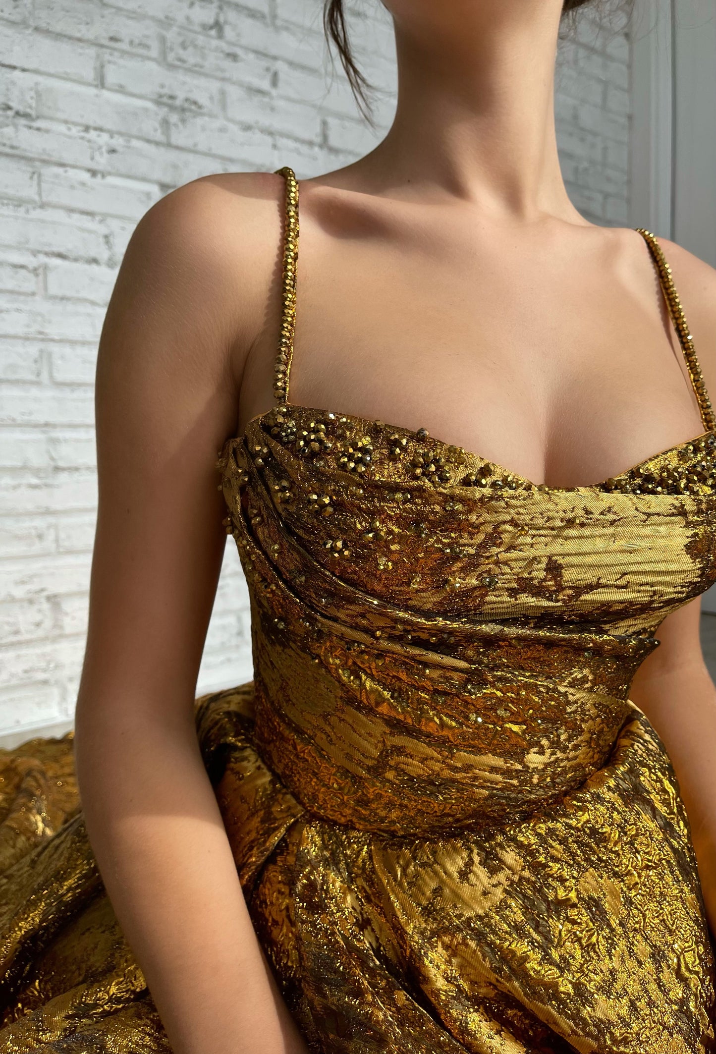 Gold A-Line dress with spaghetti straps and beading