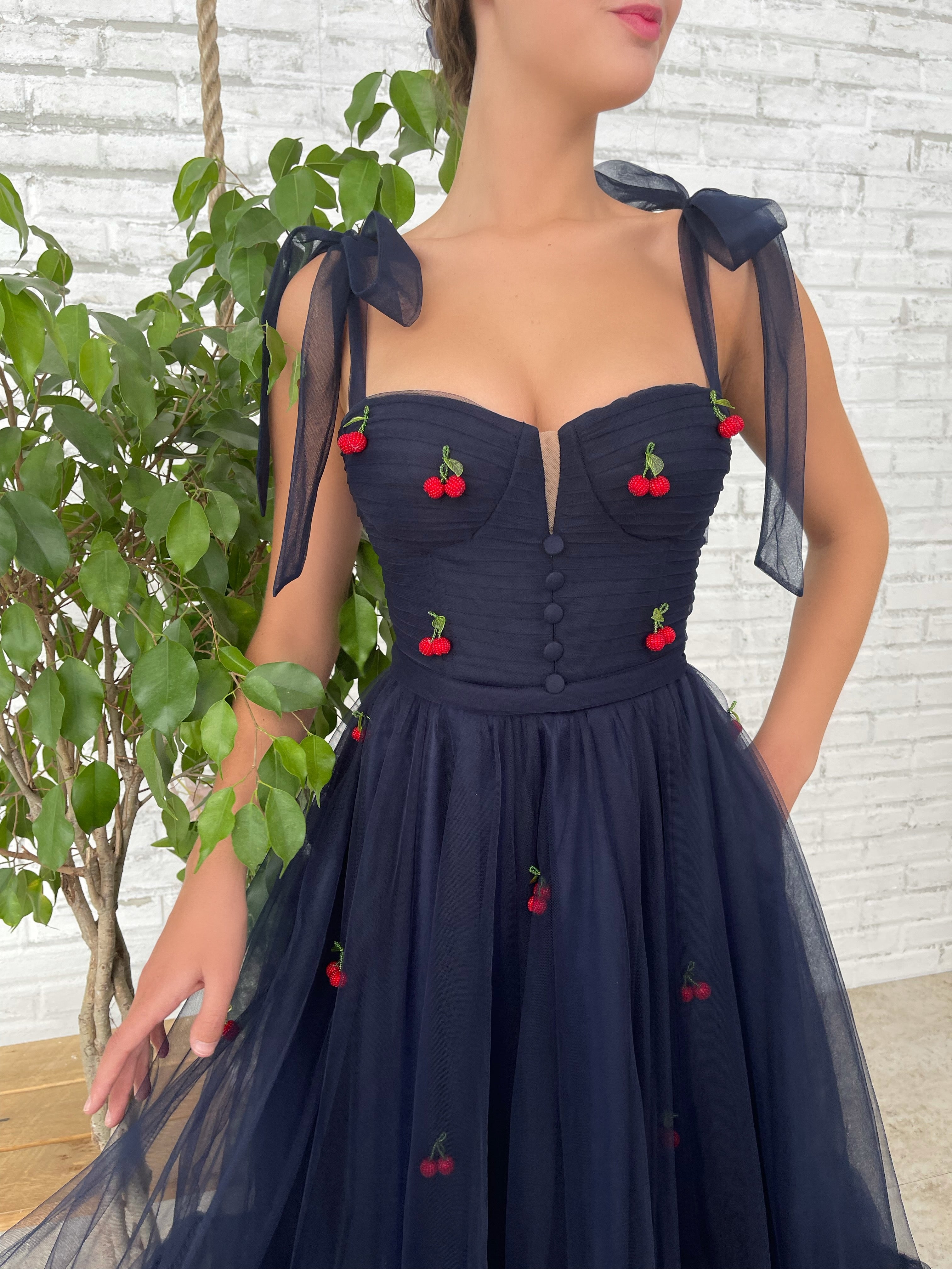 Blue midi dress with embroidered cherries and bow straps