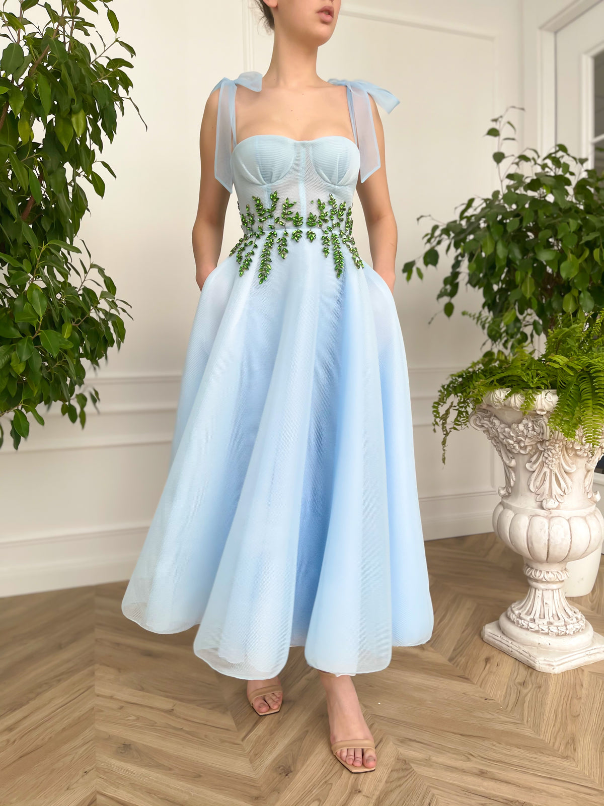Blue midi dress with bow straps and embroidery