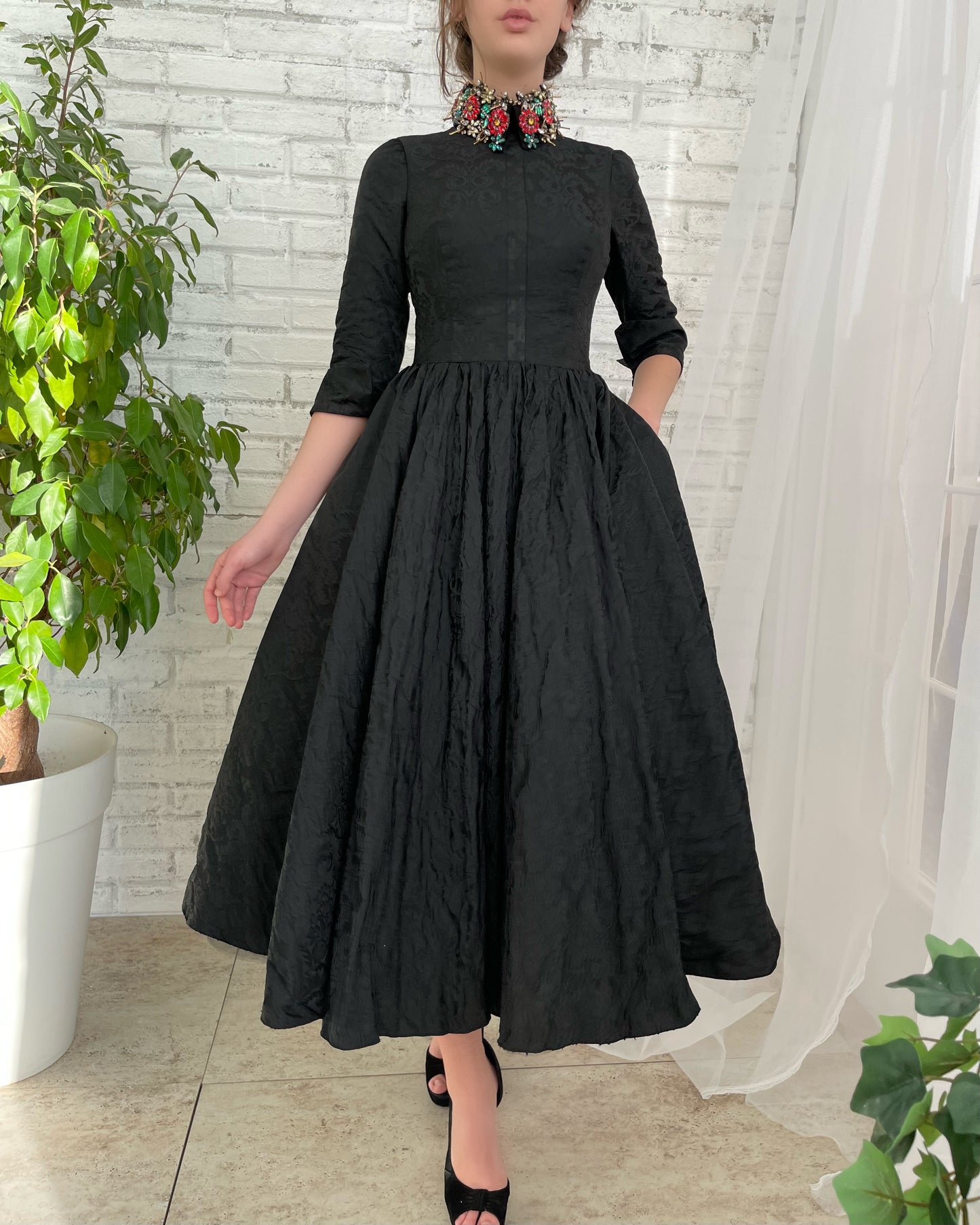 Black midi dress with short sleeves