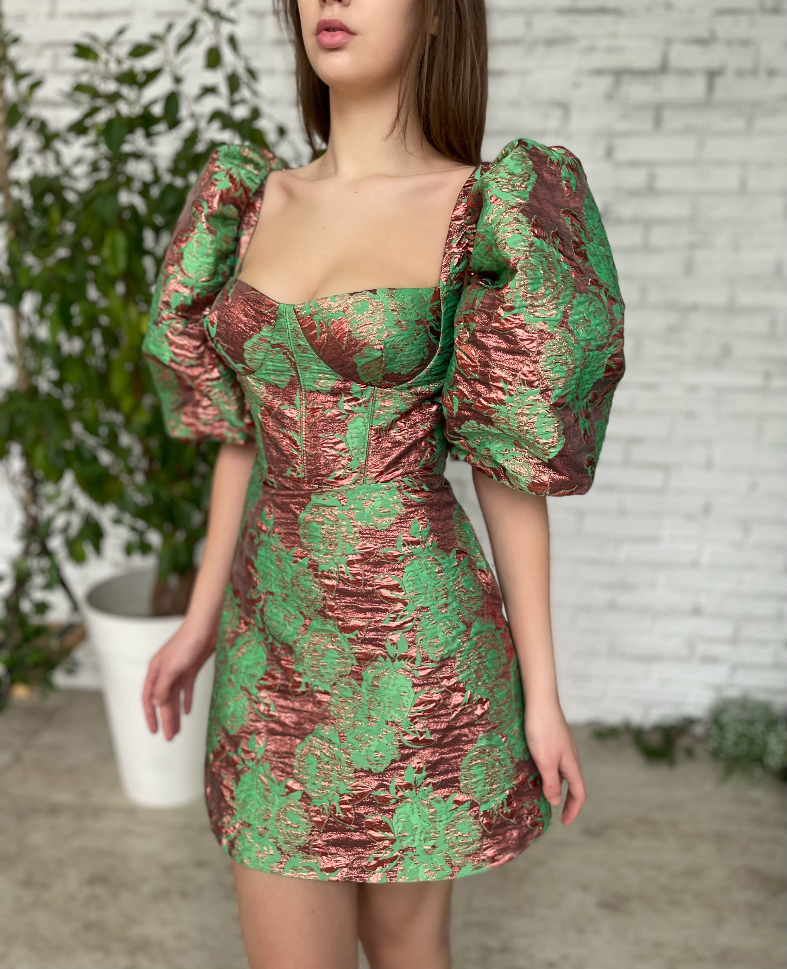 Green mini dress with short puff sleeves