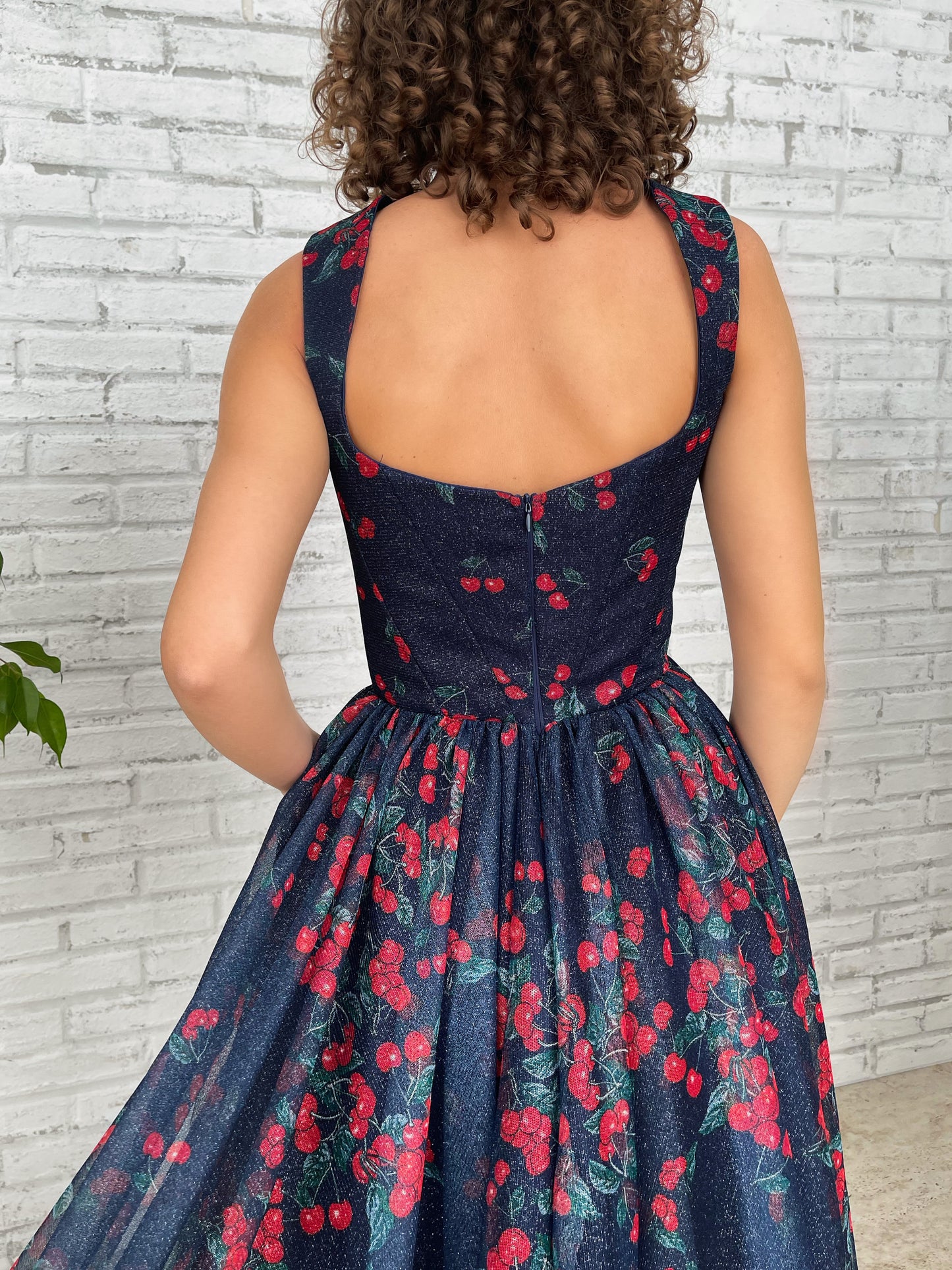 Blue midi dress with printed cherries and straps