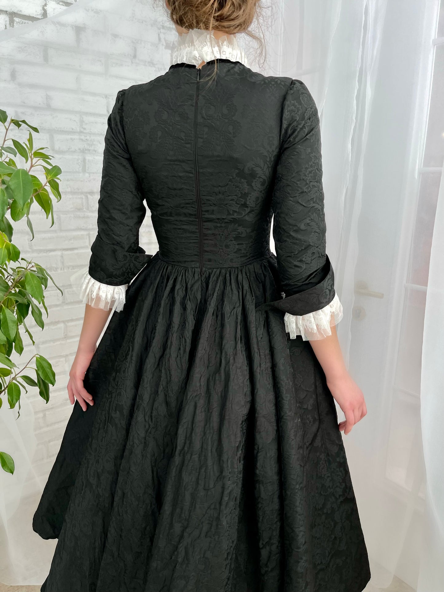 Black midi dress with short sleeves