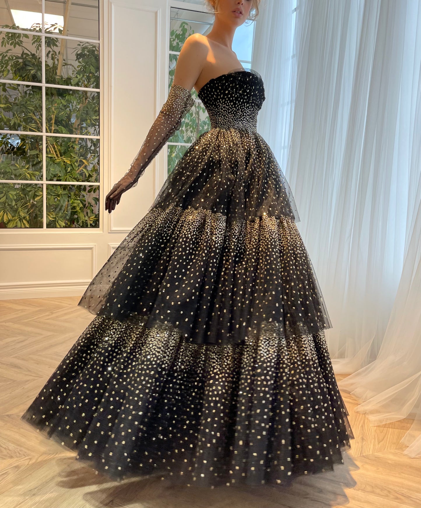 Black A-Line dress with no sleeves and gloves