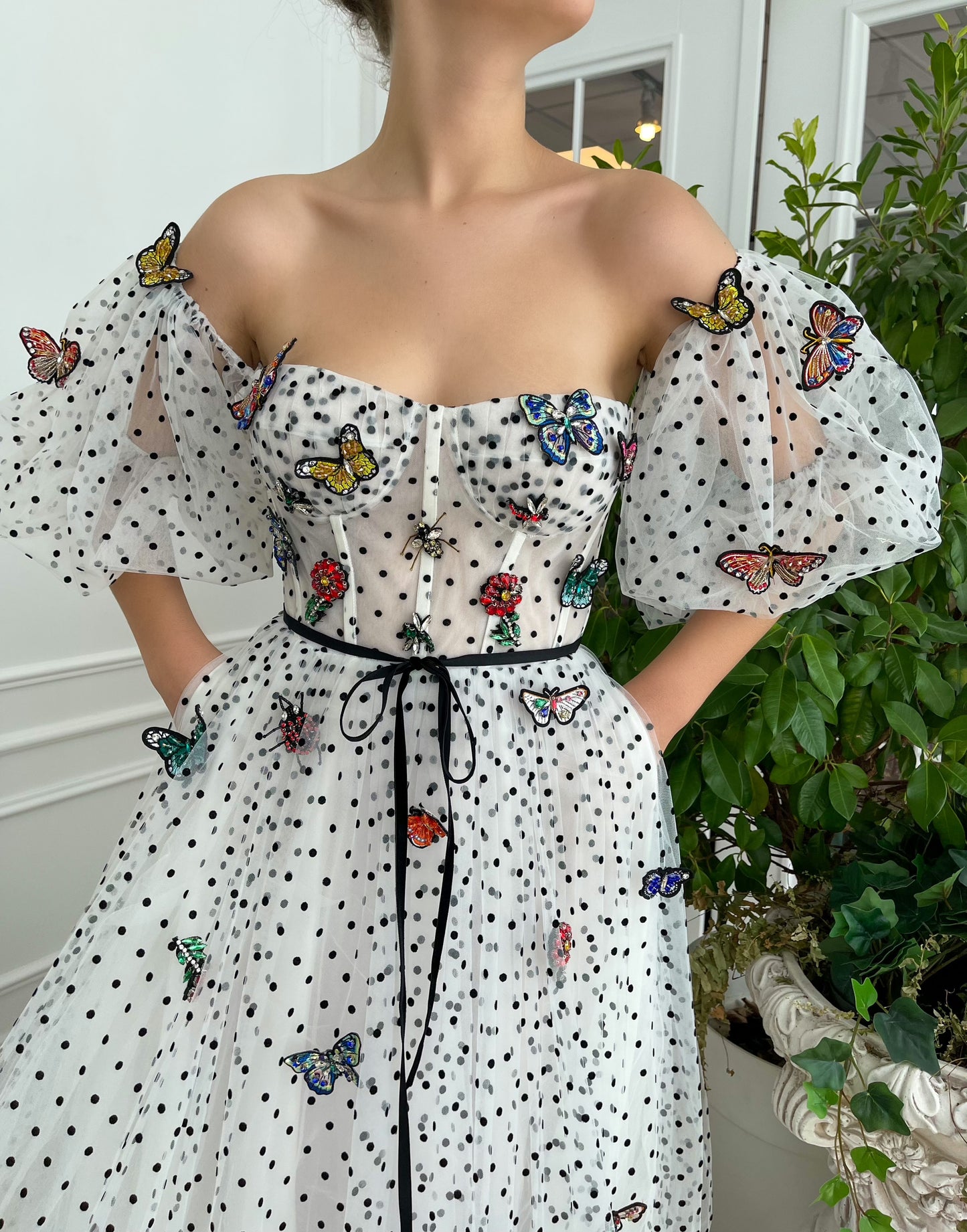 White dotted A-Line dress with embroidered butterflies and short off the shoulder sleeves