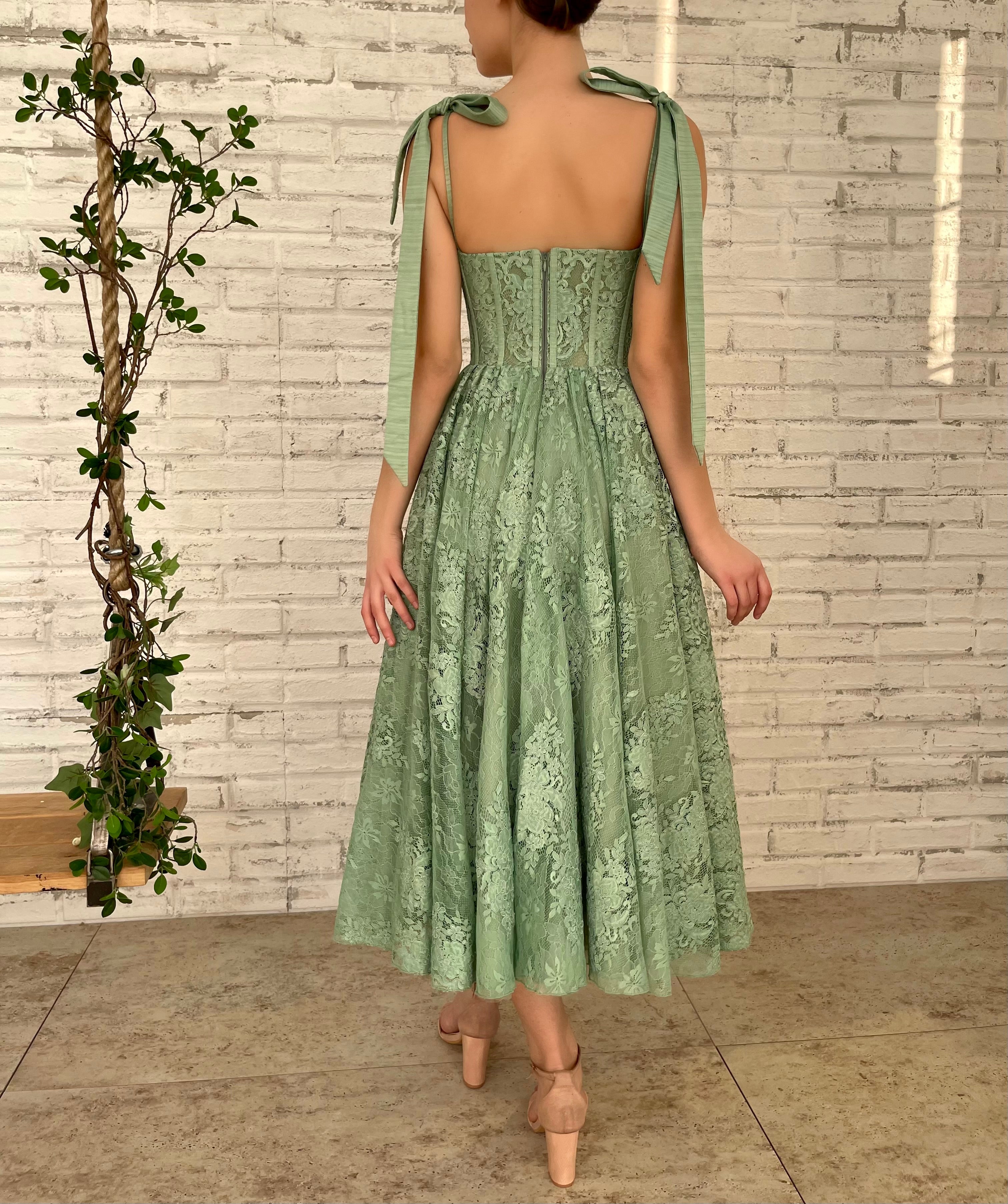 Green midi dress with bow straps