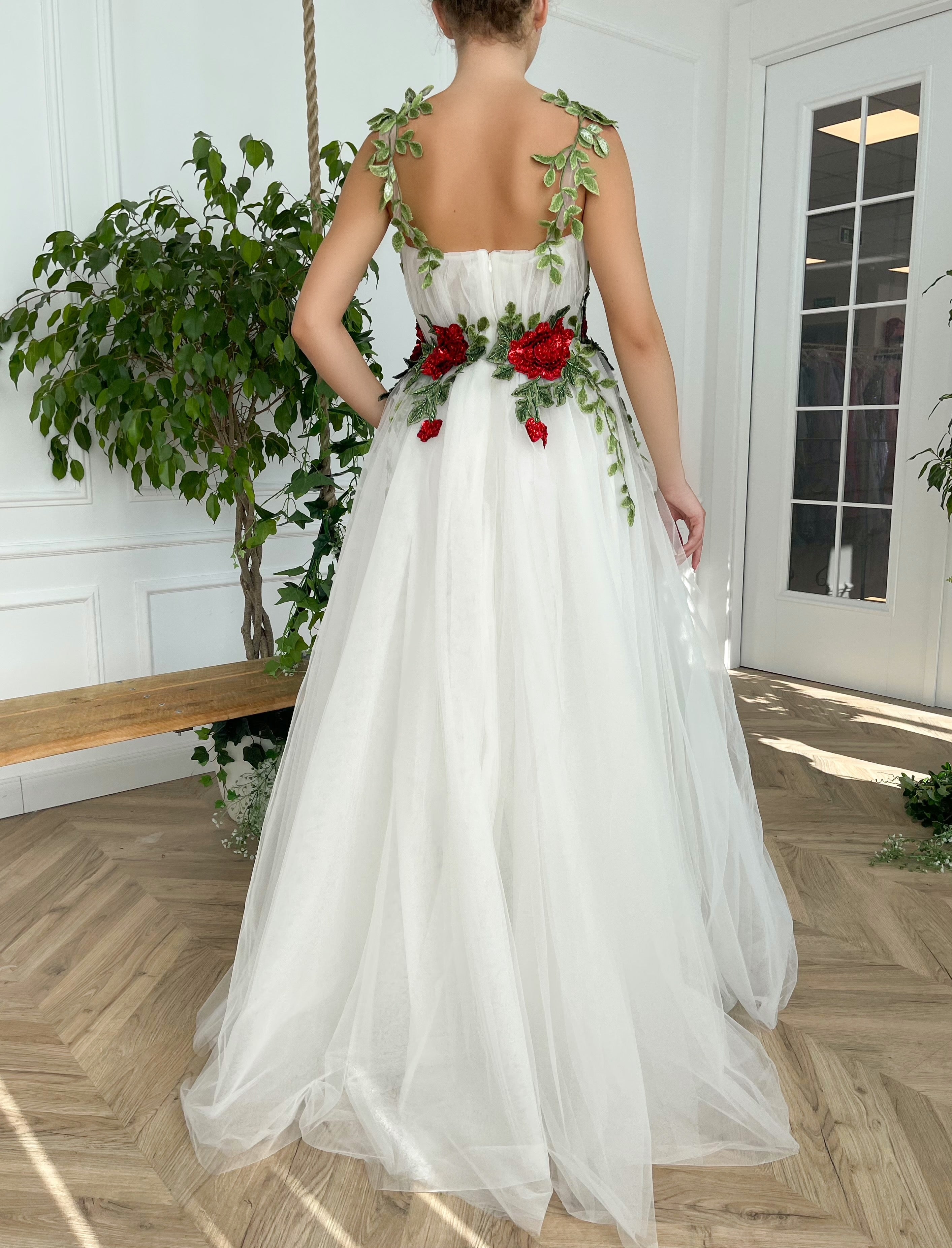 A line white bridal dress with straps and embroidered flowers