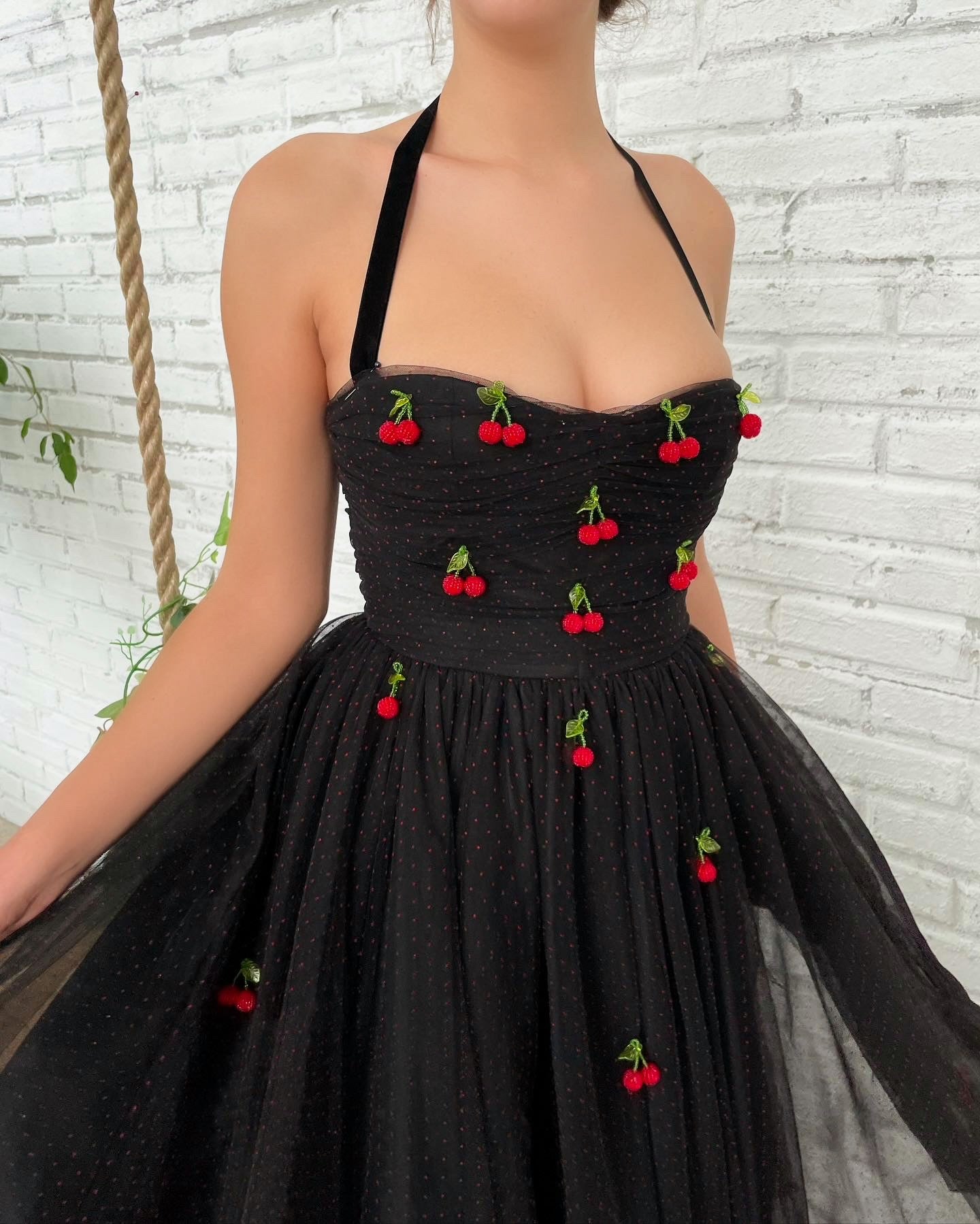 Black midi dress with spaghetti straps and embroidered cherries