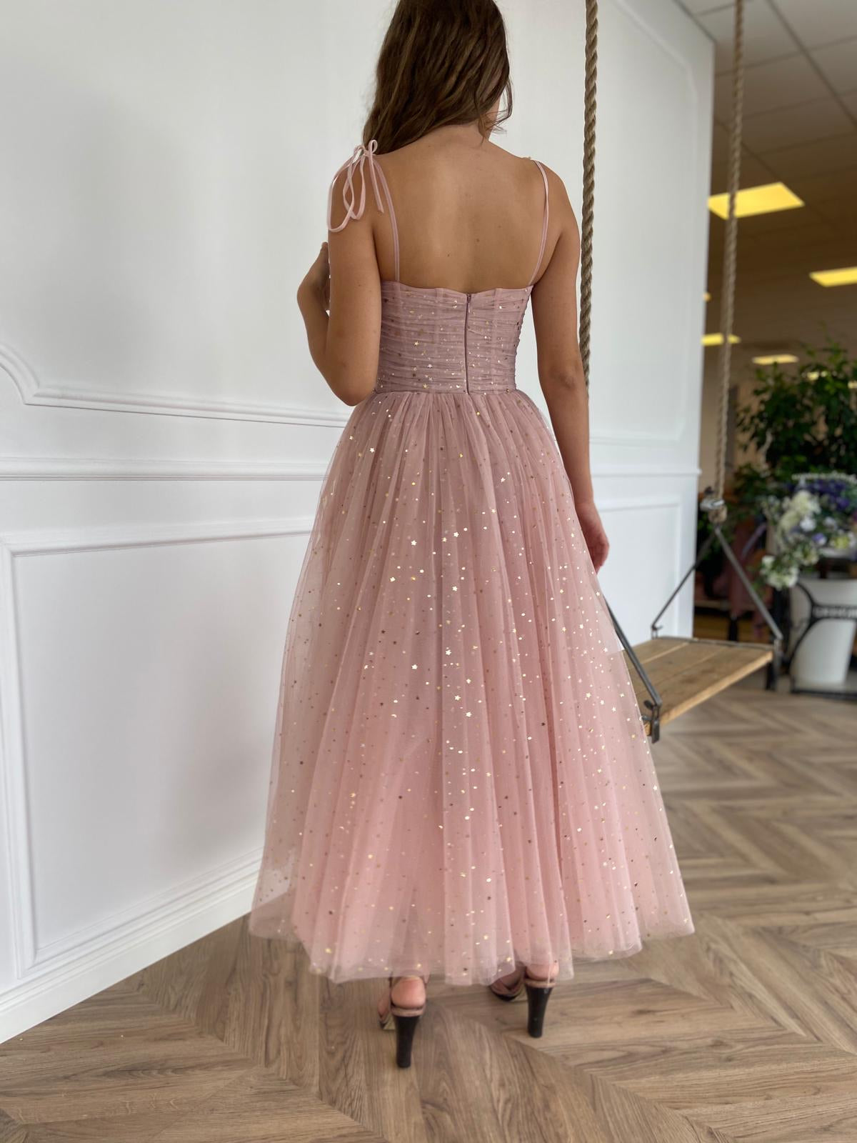 Pink midi dress with spaghetti straps and starry fabric