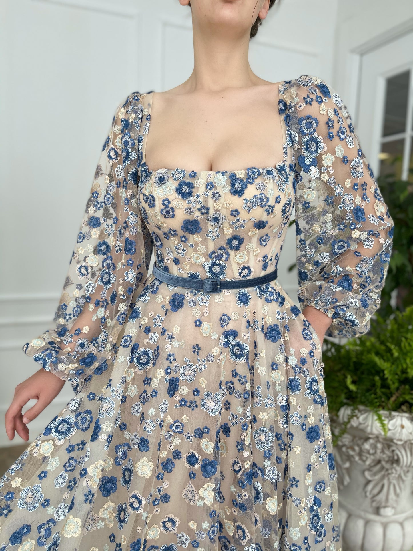 Beige A-Line dress with long sleeves, belt and printed flowers