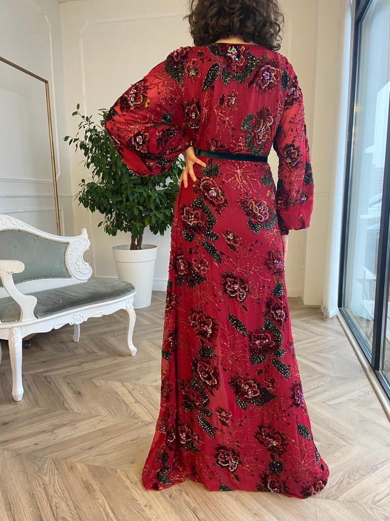 Red sheath dress with v-neck, long sleeves and embroidery