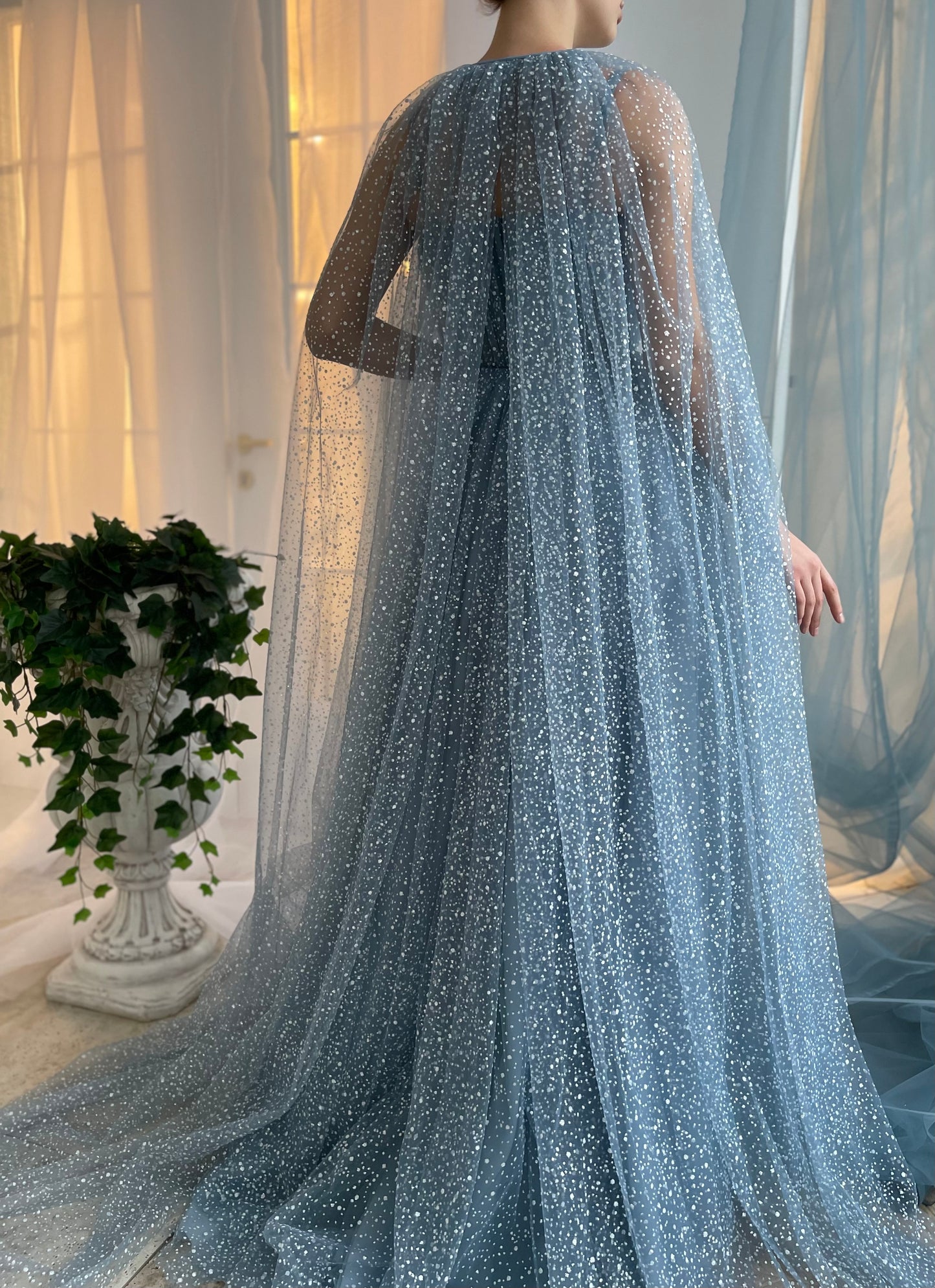 Blue A-Line dress with no sleeves and cape